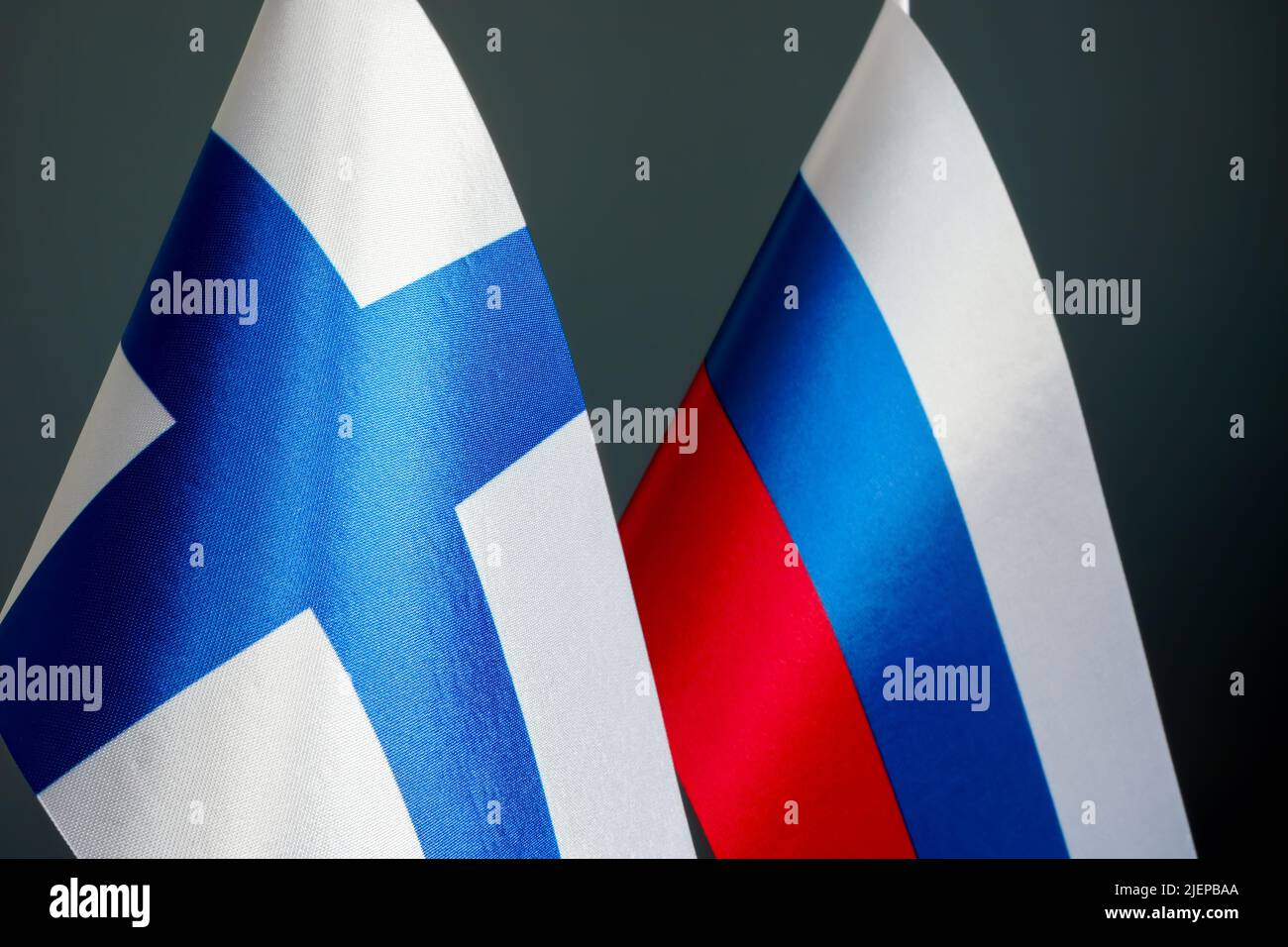 Close up of the flags of Finland and Russia. Stock Photo