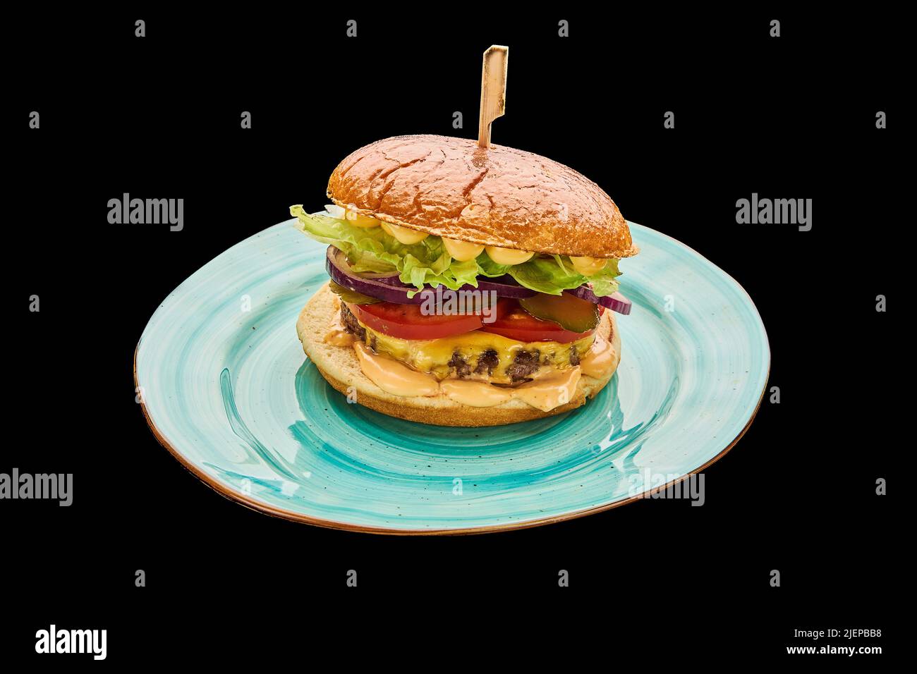 american cheeseburger isolated on a black background Stock Photo