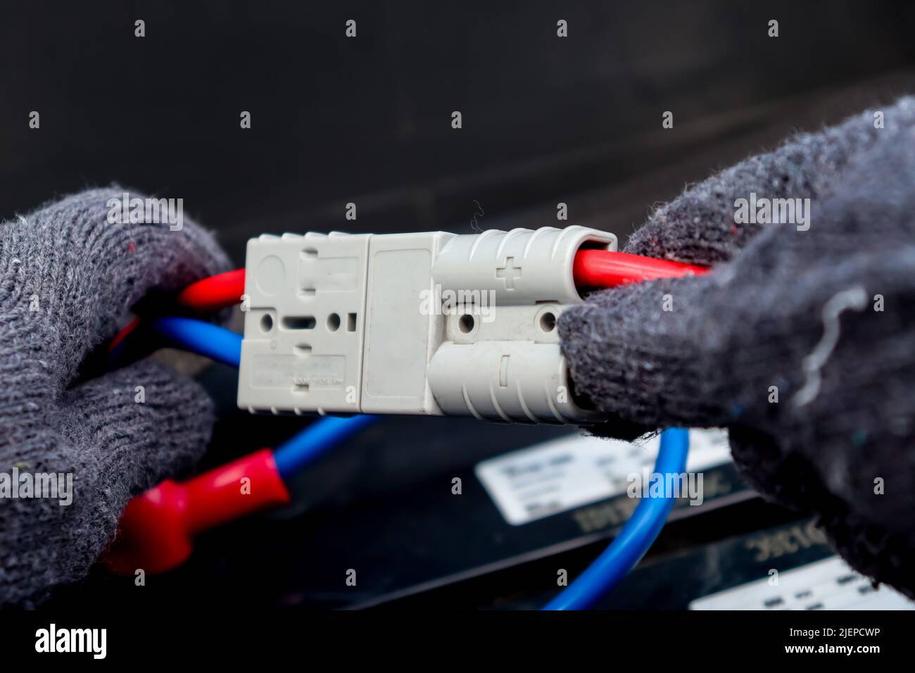 plug in the battery charger for working Stock Photo Alamy