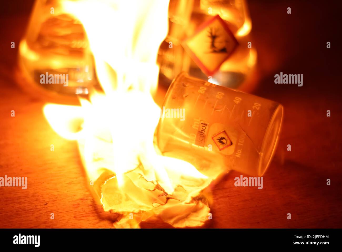 Chemical alcohol fire in the lab at night Stock Photo