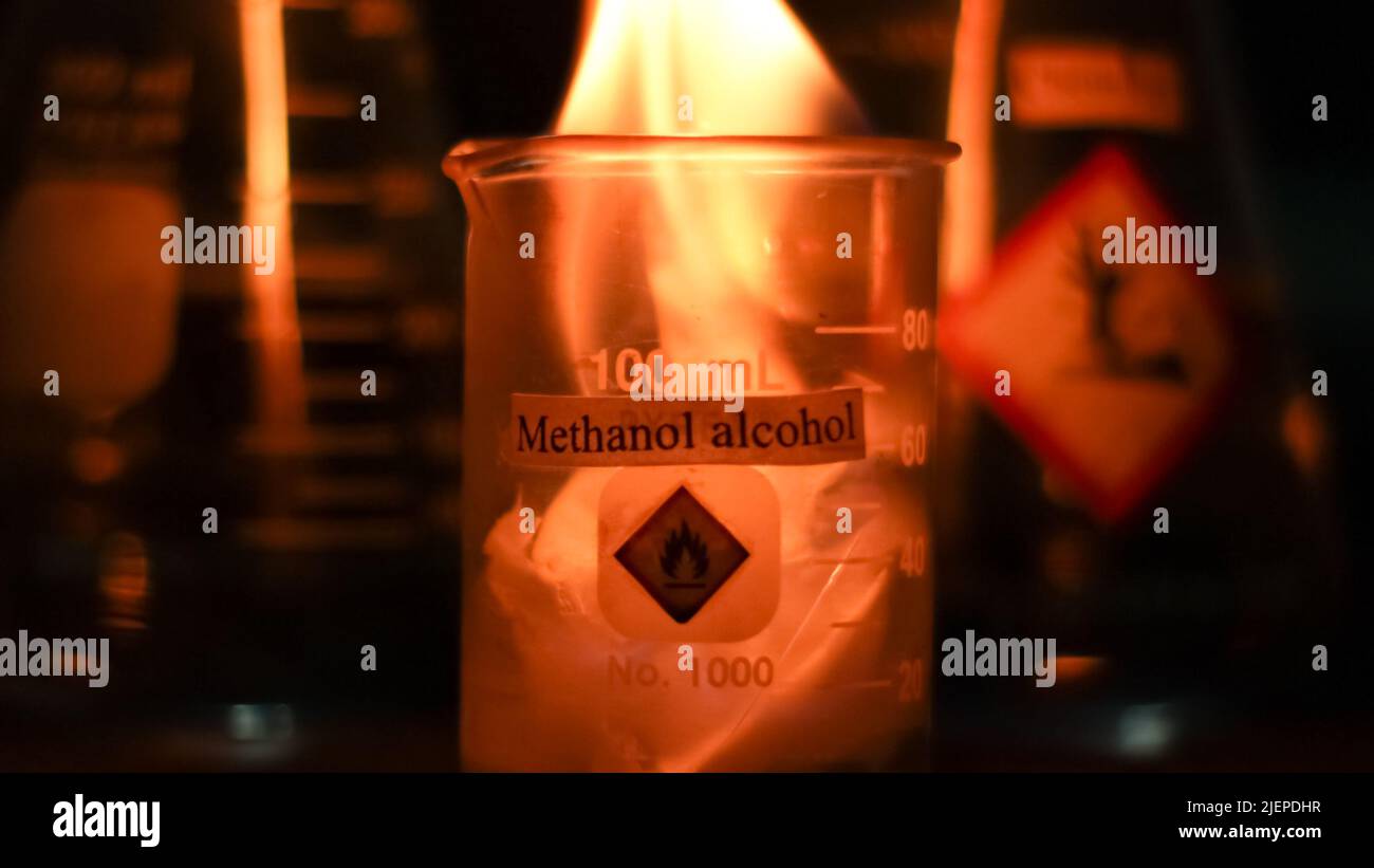 Chemical alcohol fire in the lab at night Stock Photo