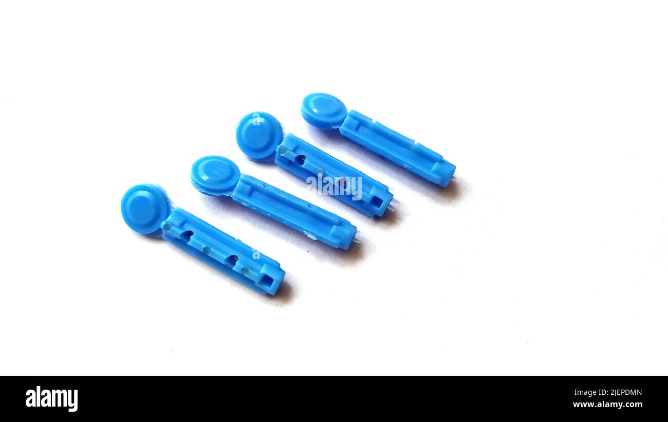 Blood Lancet image,Lancet Needles for Diabetes Finger on white background Stock Photo Alamy