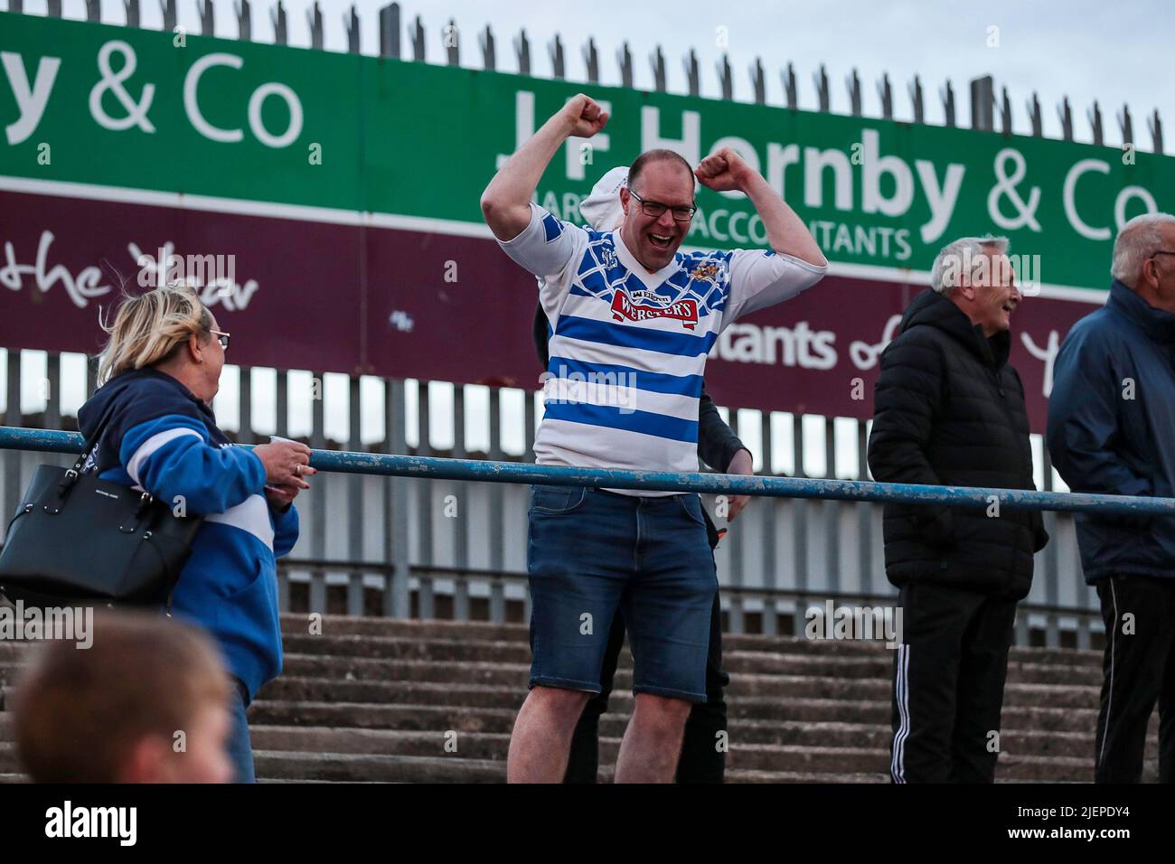 A Halifax Panthers fan celebrates during the Betfred Championship match between Barrow RLFC and Halifax RLFC at Craven Park, Barrow on 27 June 2022. Photo by Simon Hall. Editorial use only, license required for commercial use. No use in betting, games or a single club/league/player publications. Credit: UK Sports Pics Ltd/Alamy Live News Stock Photo