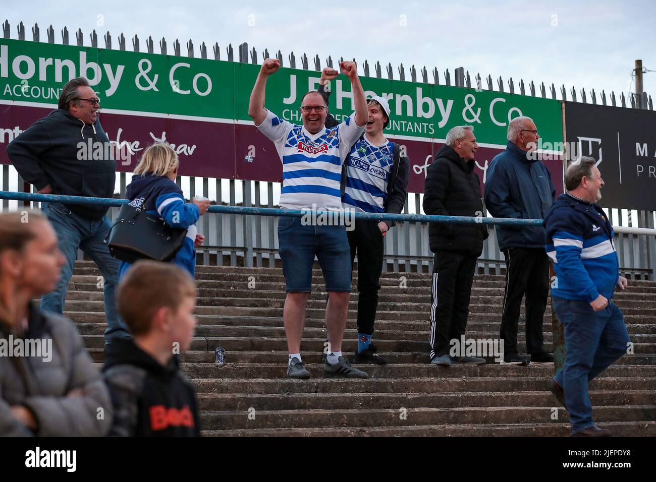 Halifax Panthers fans celebrate during the Betfred Championship match between Barrow RLFC and Halifax RLFC at Craven Park, Barrow on 27 June 2022. Photo by Simon Hall. Editorial use only, license required for commercial use. No use in betting, games or a single club/league/player publications. Credit: UK Sports Pics Ltd/Alamy Live News Stock Photo