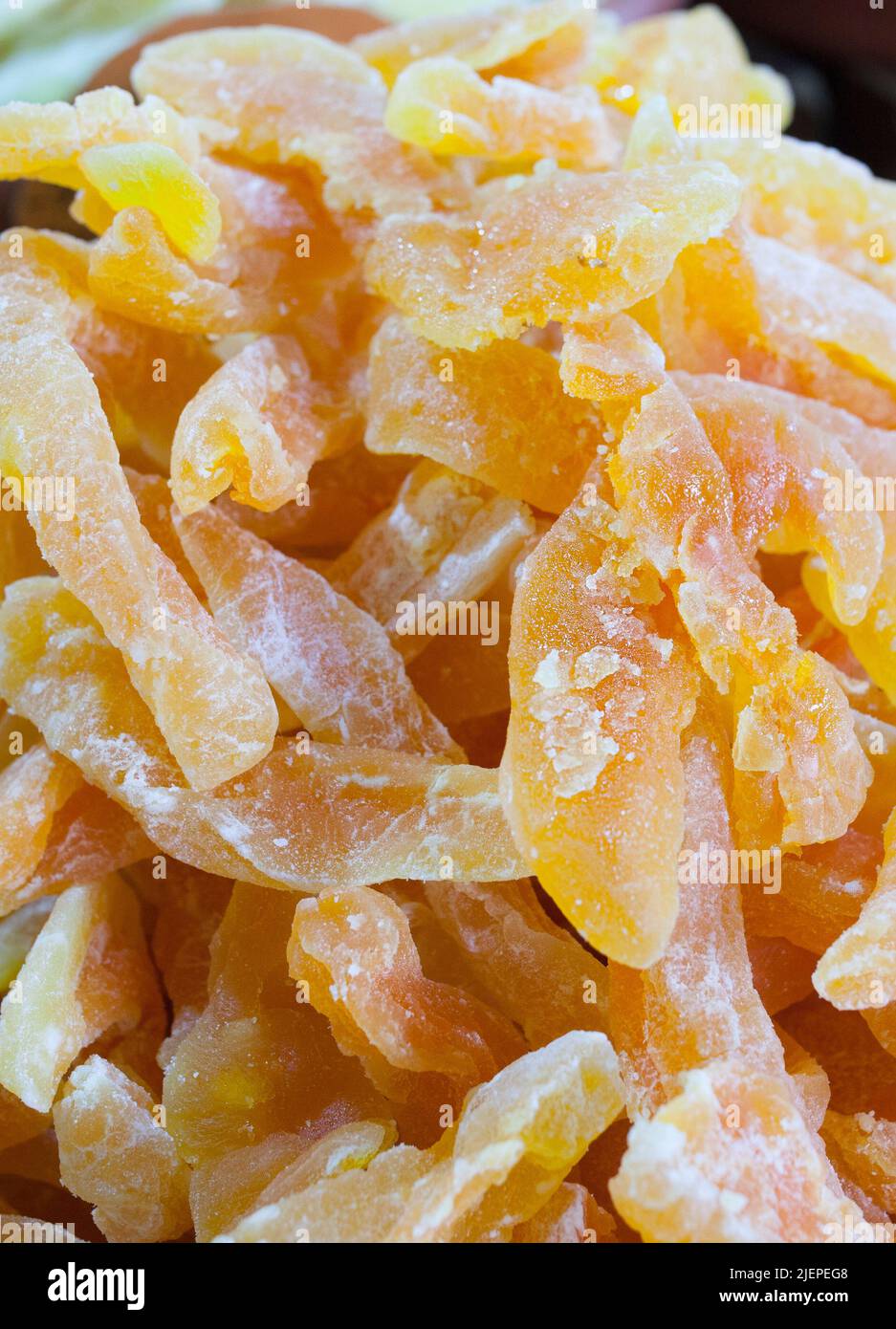 Bowl with dried melon fruit. Slices displayed at street market stall Stock Photo