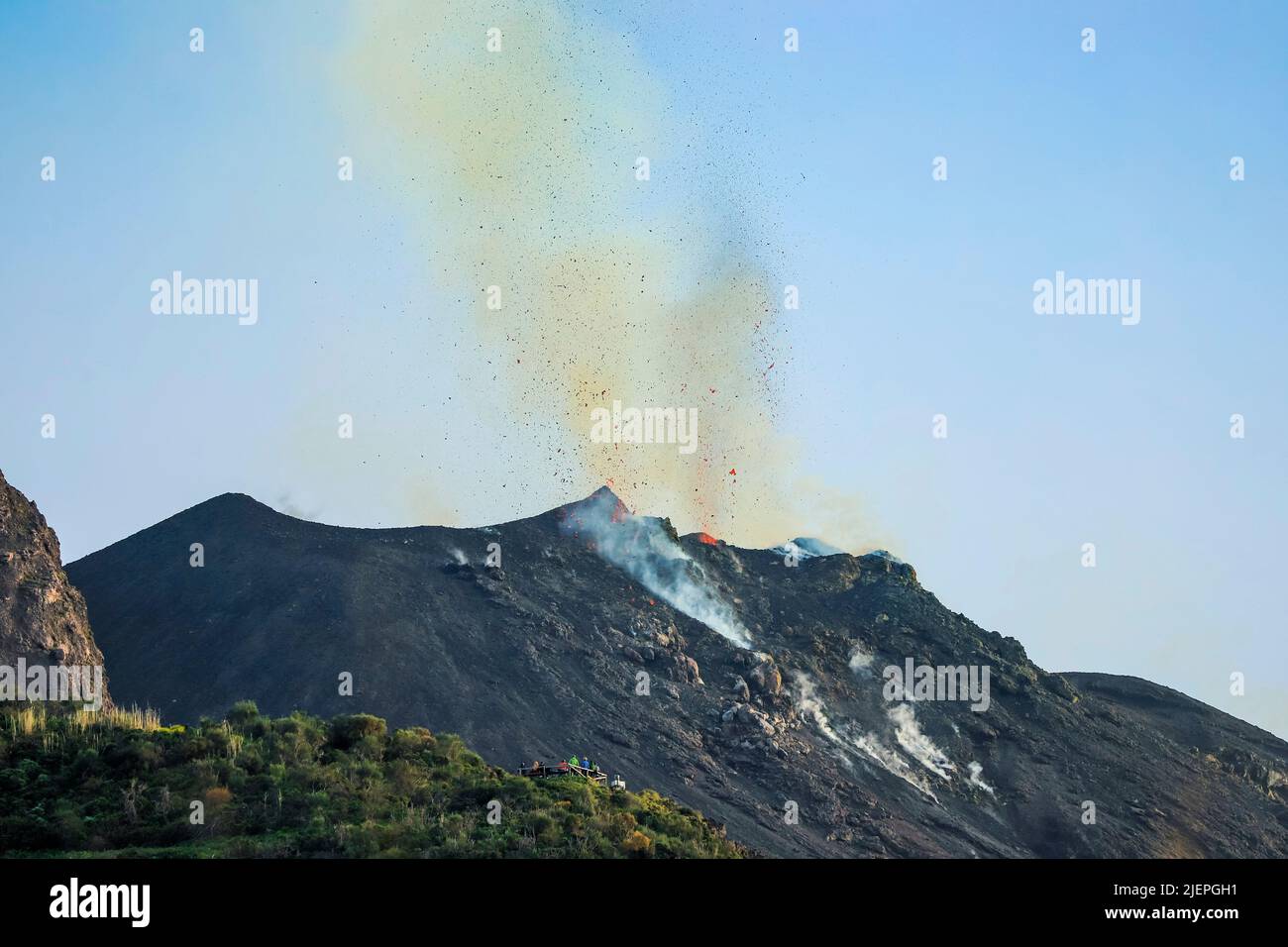 Lava bombs erupt from multiple vents at this volcano. This explosive
