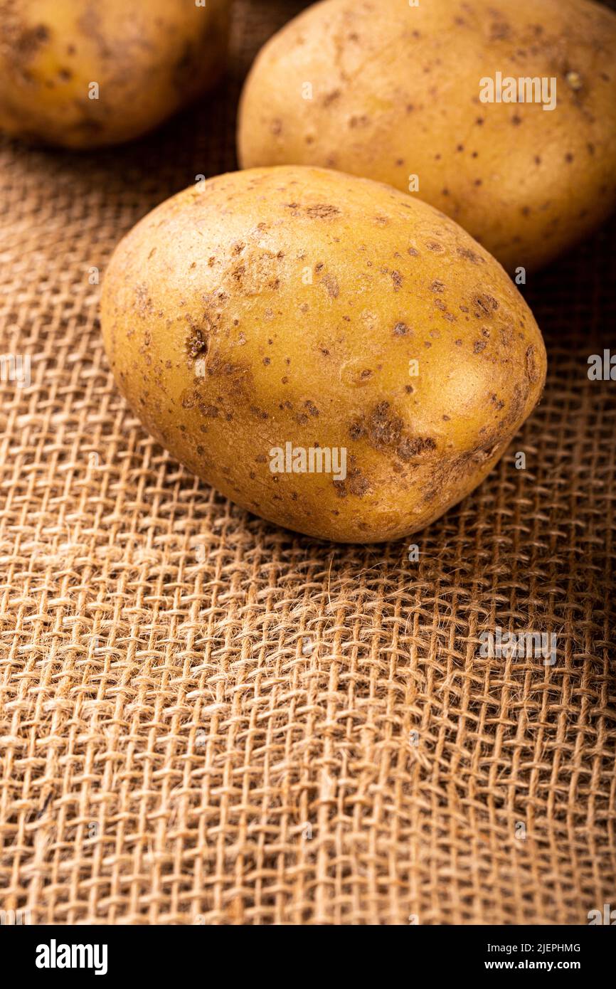 Raw whole washed organic potatoes Stock Photo