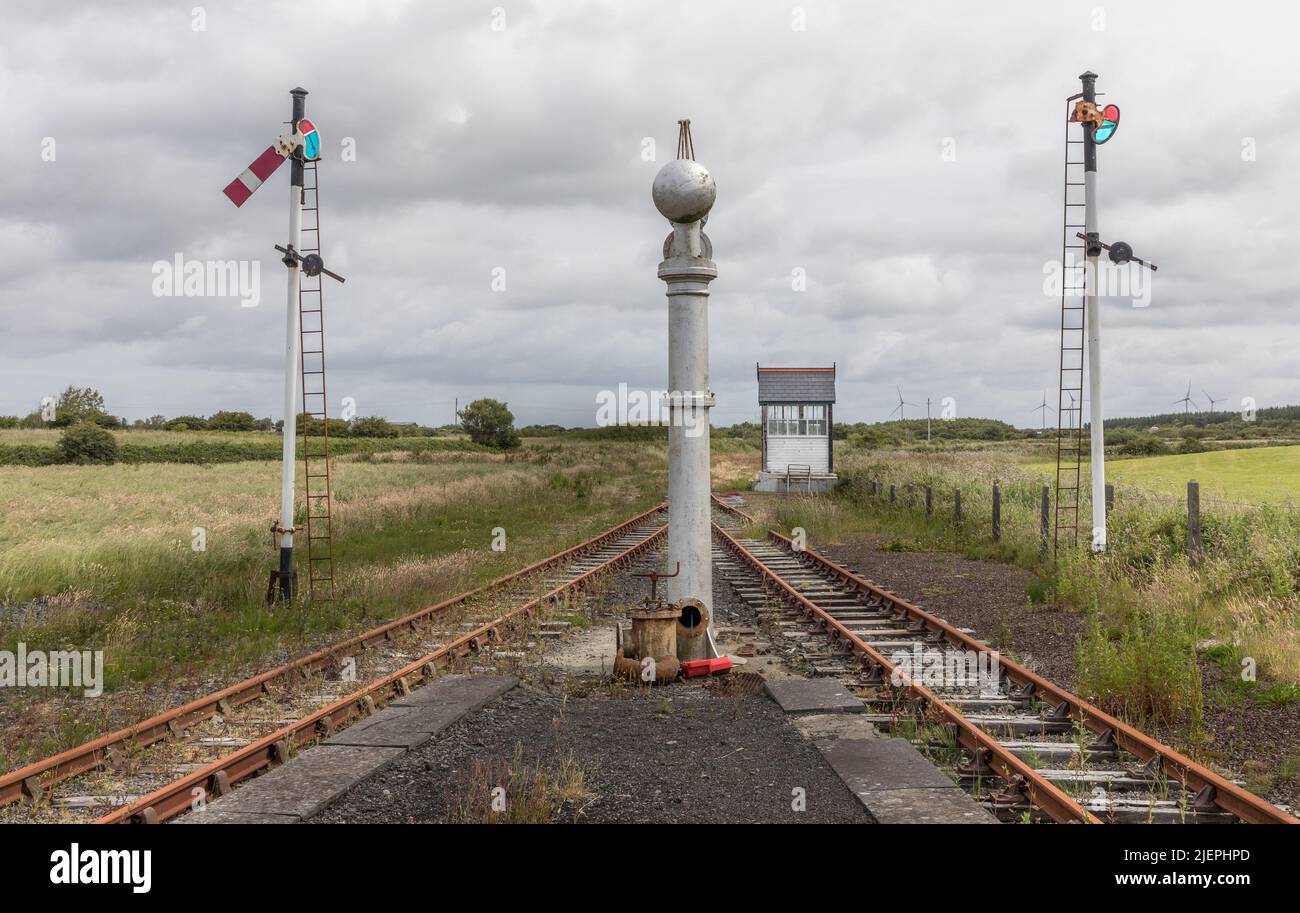 Moyasta Junction, Clare, Ireland. 27th June, 2022. Semaphore signals and cabin part of the West Clare Railway at Moyasta Junction, Co. Clare, Ireland.  - Picture David Creedon Stock Photo