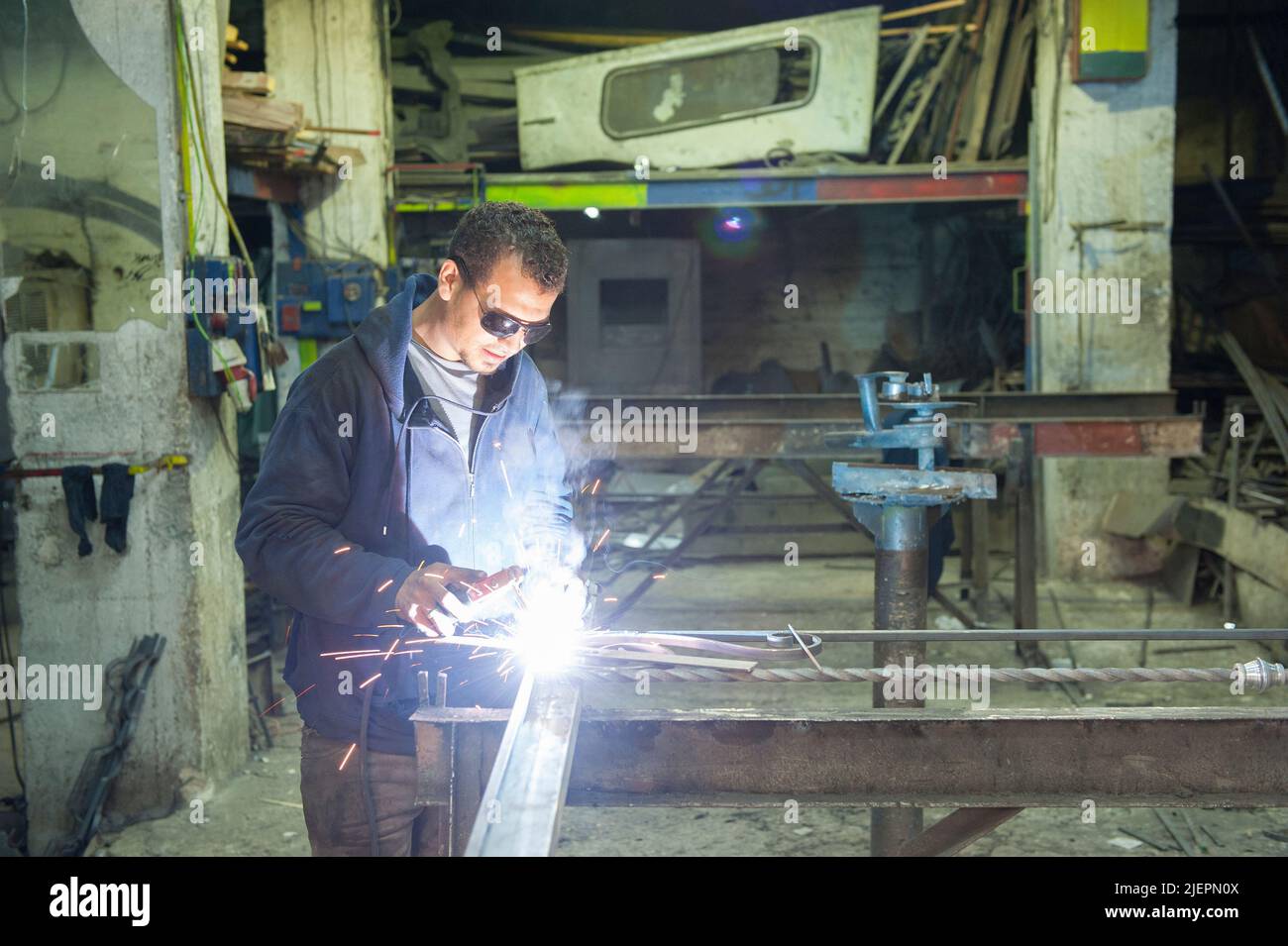 Amman, Jordan. One of the many metal and iron workshops down town Amman, ware craftsmen make handmade metal structures to be applied in industry and more. Stock Photo