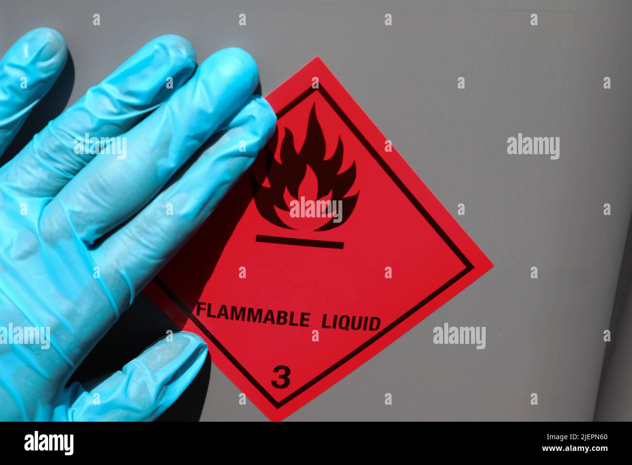 Labeling a sign on a chemical tank and flammable symbol Stock Photo Alamy