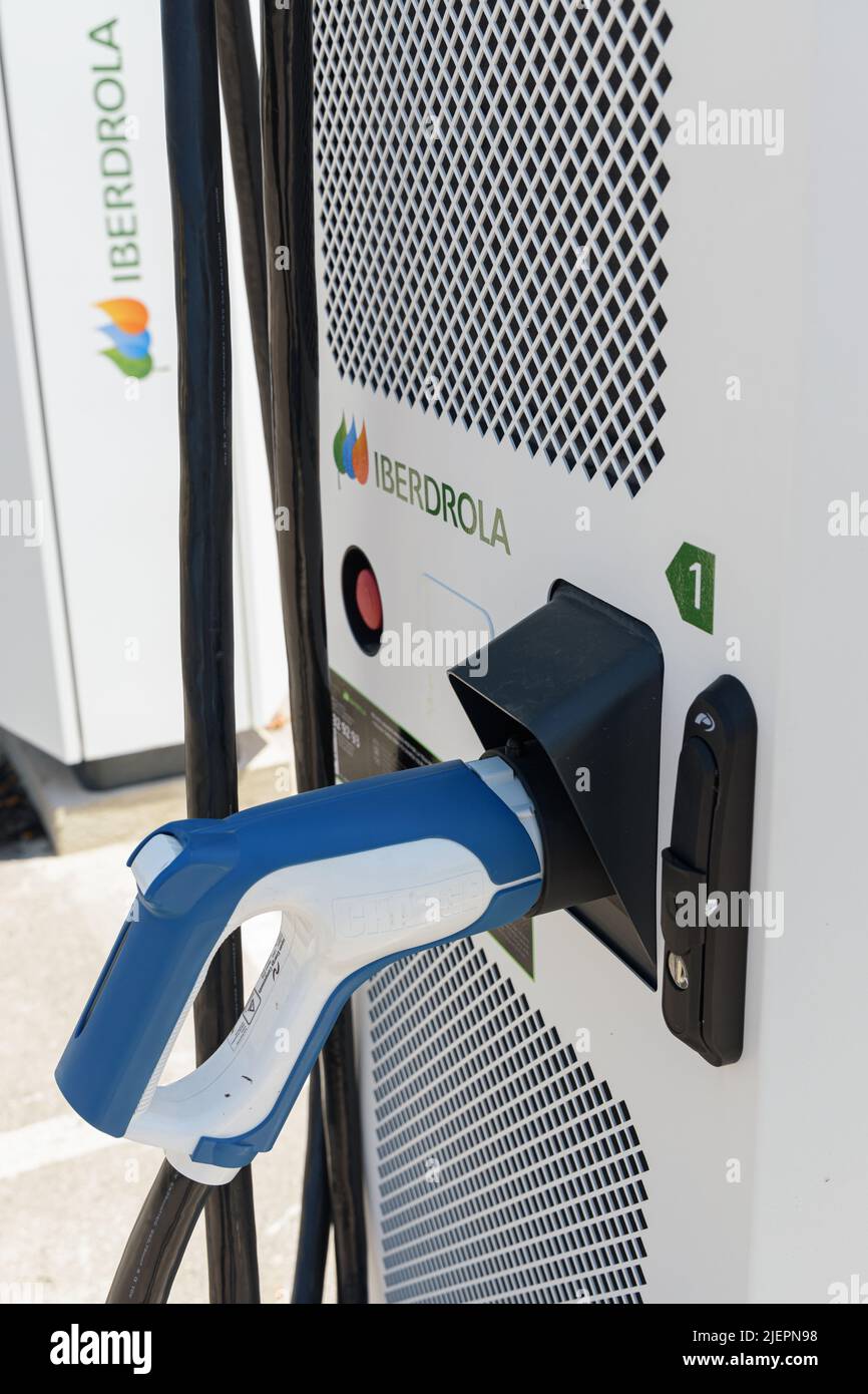 ALFAFAR, SPAIN - JUNE 06, 2022: Electric car charging station powered by Iberdrola Stock Photo