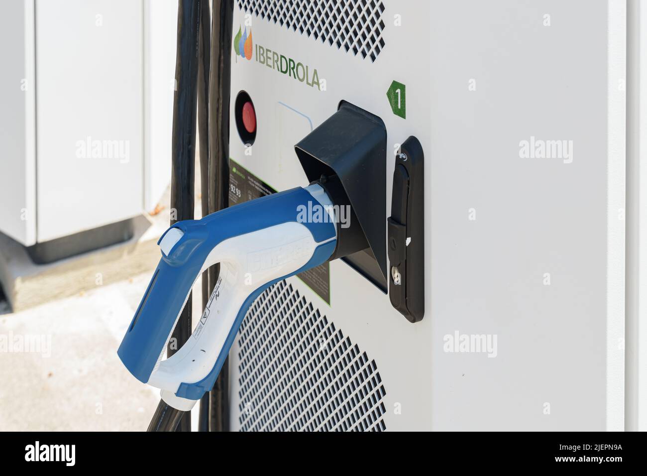 ALFAFAR, SPAIN - JUNE 06, 2022: Electric car charging station powered by Iberdrola Stock Photo