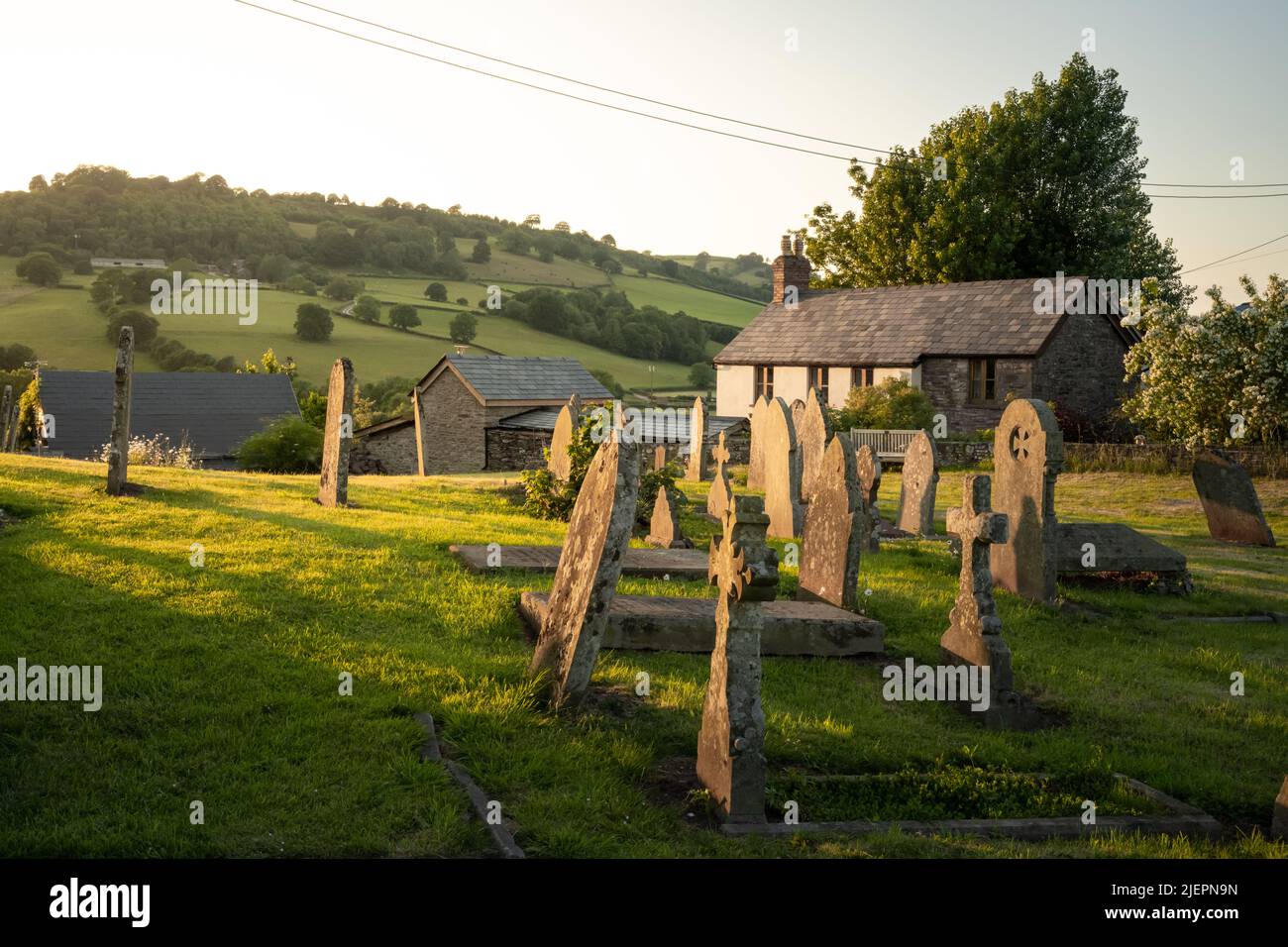 cemetery-stones-lit-by-the-setting-sun-in-wales-stock-photo-alamy