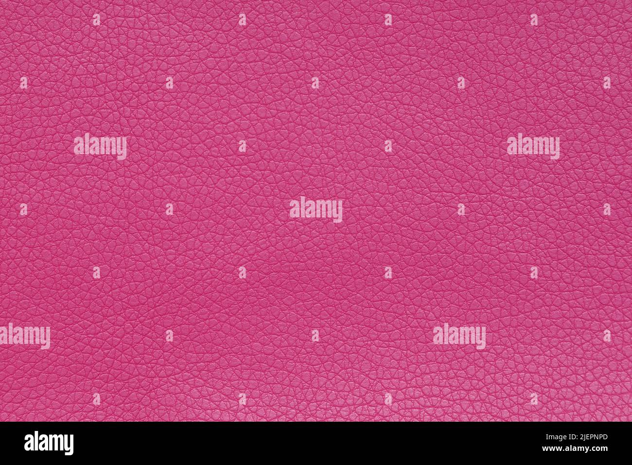 Background image - pink leather texture with textured dressing. Stock Photo