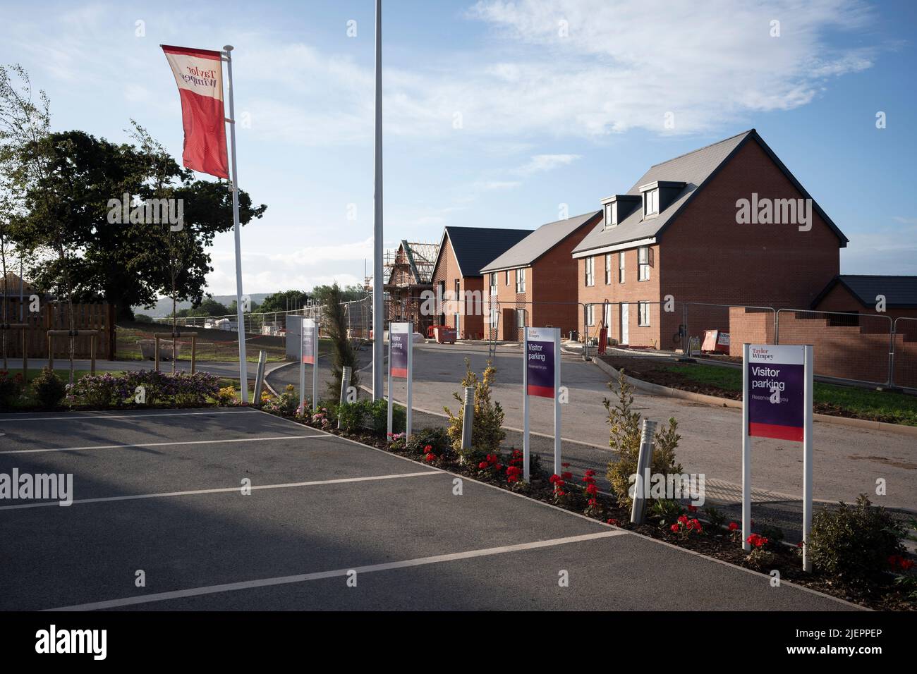 A semi-completed housing estate on former farmland, a landscape that is fast changing to residential use by housing developer Taylor Wimpey at Netherton Grange, Youngwood Lane, Nailsea, on 7th November 2021, in Nailsea, North Somerset, England. Nearly 170 homes are being built here on the edge of Nailsea in rural North Somerset after detailed plans were approved. Thirty per cent of the homes will be affordable. Stock Photo