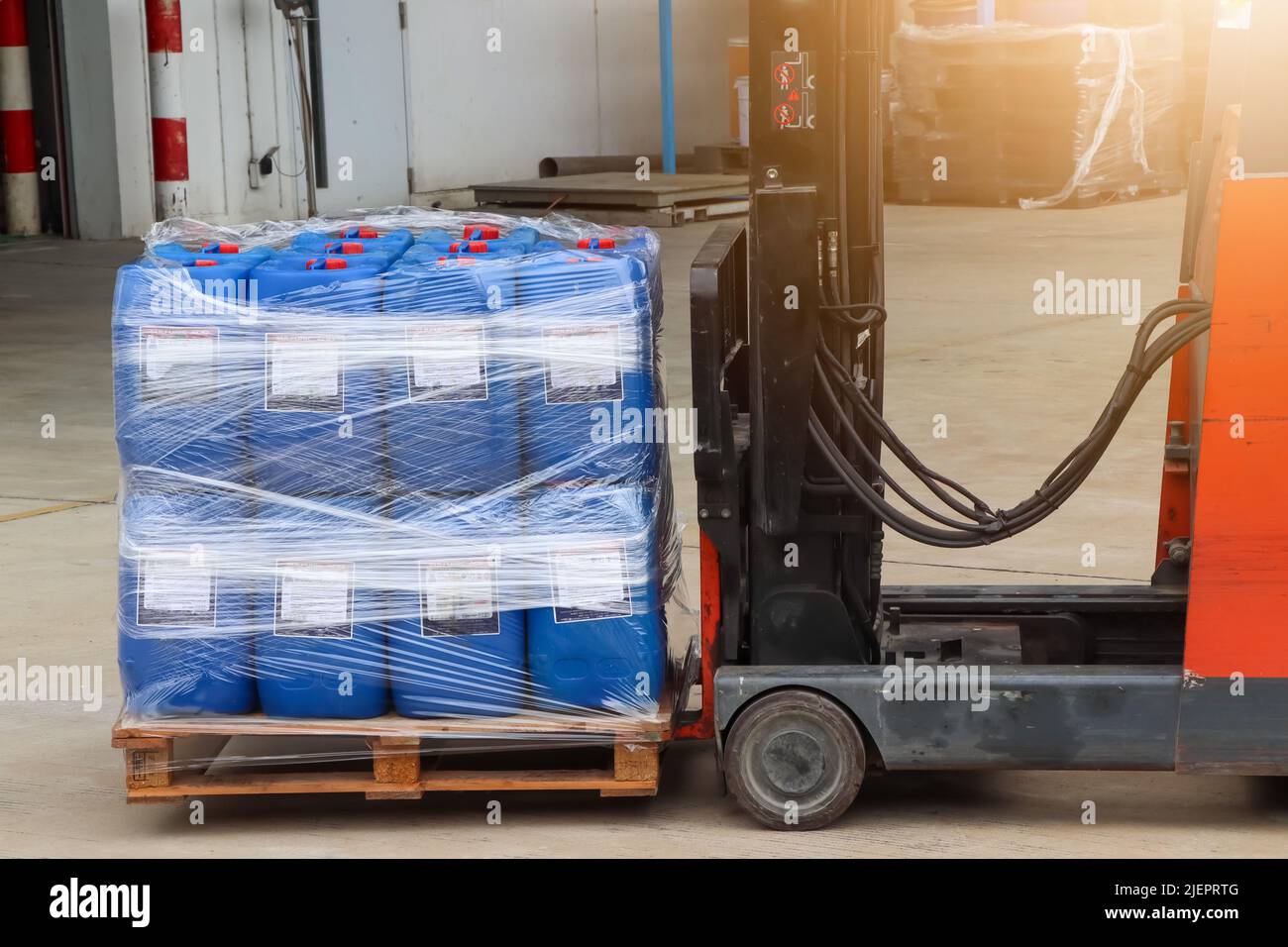 Forklifts are moving dangerous chemicals in the industry Stock Photo