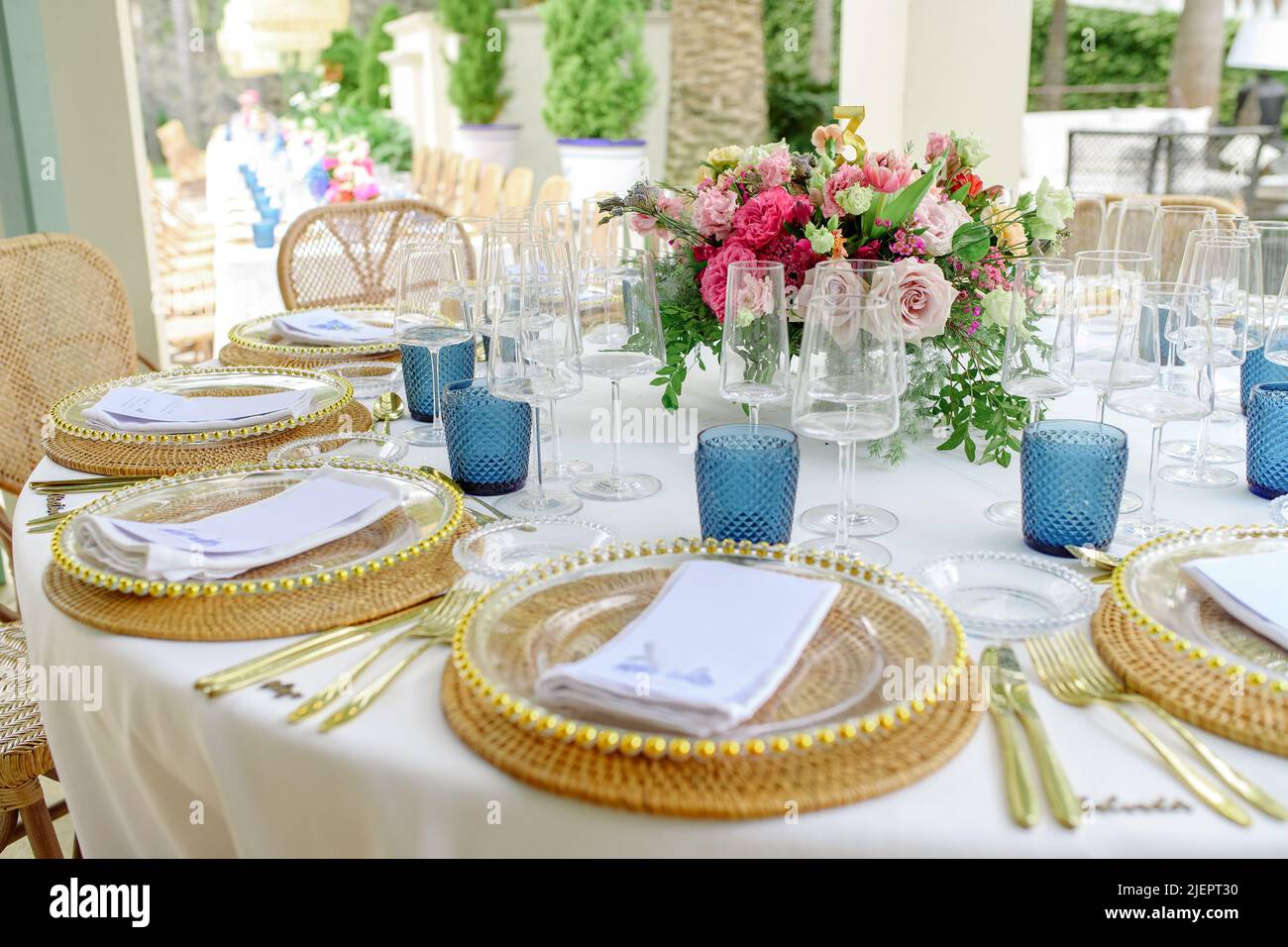Banquet table with flowers and tableware Stock Photo Alamy