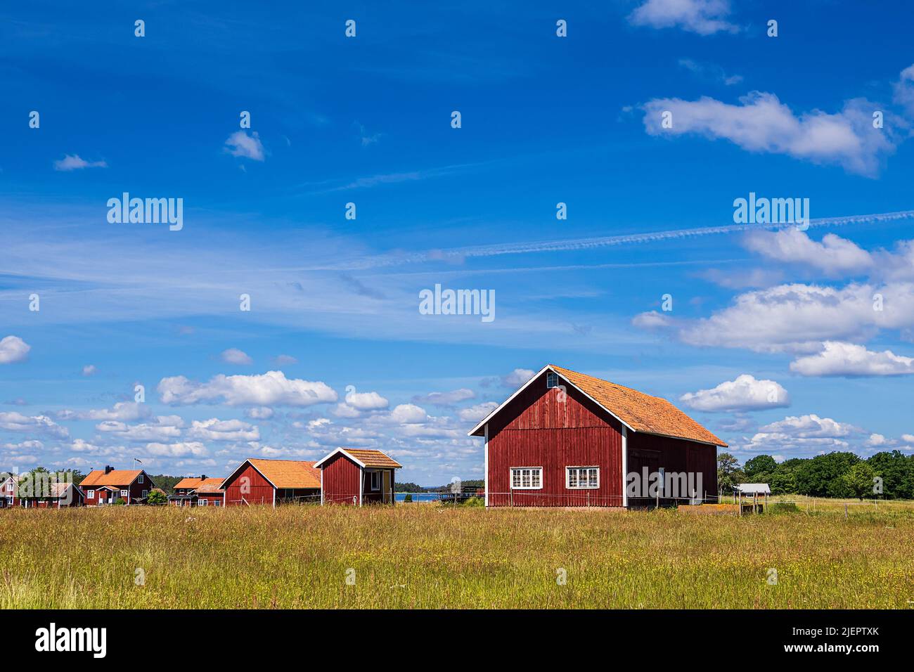 Red wooden building on the island Sladö in Sweden. Stock Photo