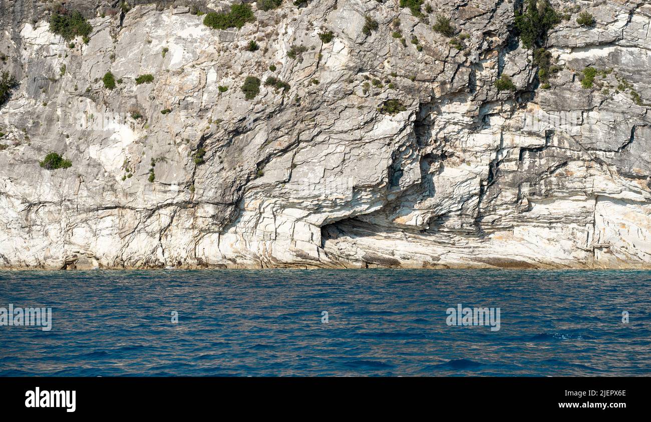 Beautiful summer Mediterranean coast with massive rocky cliff Stock Photo