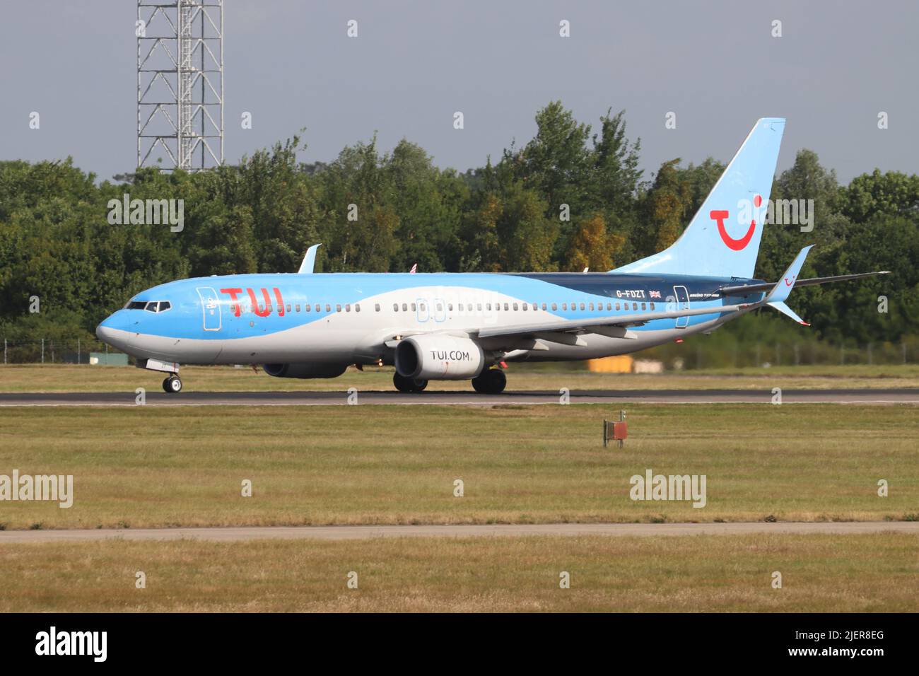 TUI Airways, Boeing 737 G-FDZT arriving at Stansted Airport, Essex, UK Stock Photo