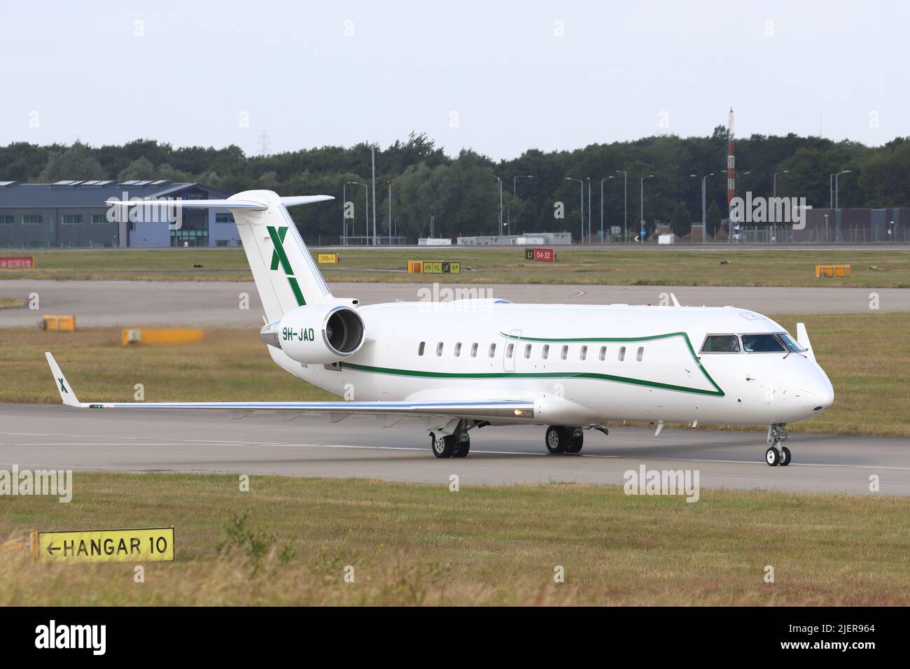 9H-JAD, Mitsubishi Challenger 850, departing Stansted Airport, Essex, UK Stock Photo