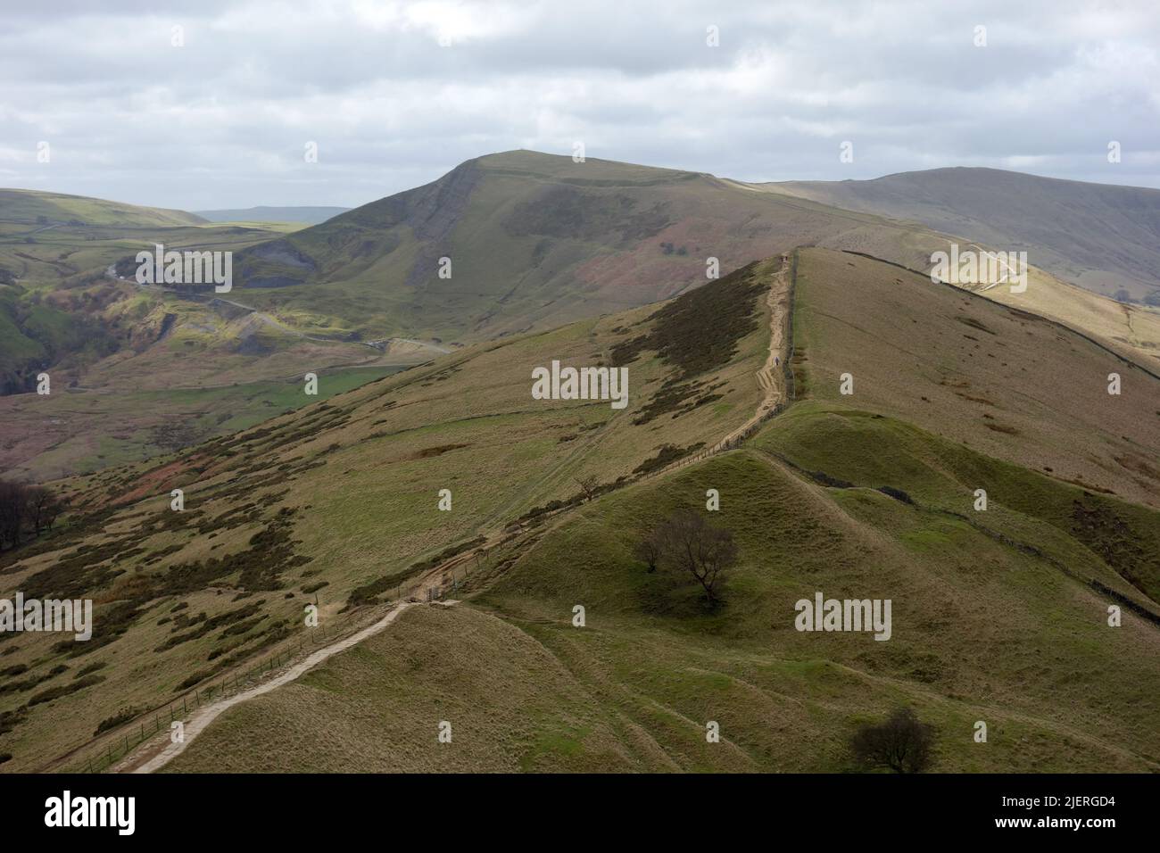 The Ridge Path over Hollins Cross Leading to Distant 'Mam Tor' from the Top of 'Black Tor' in Edale, Derbyshire, Peak District National Park, England. Stock Photo