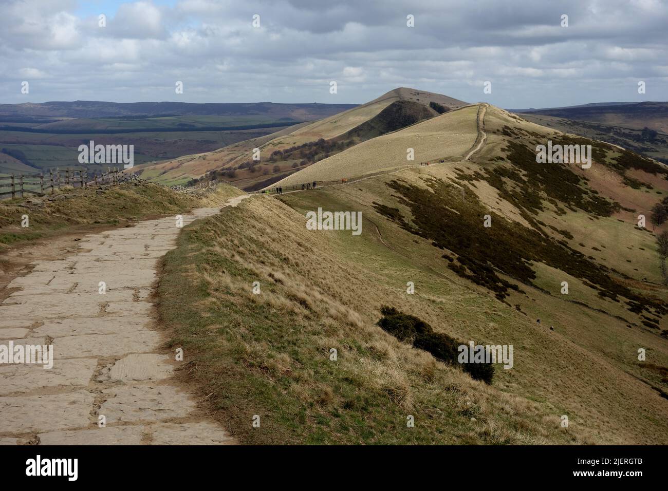 The Ridge Path to Hollins Cross Leading to the Distant 'Mam Tor' in Edale, Derbyshire, Peak District National Park, England. Stock Photo