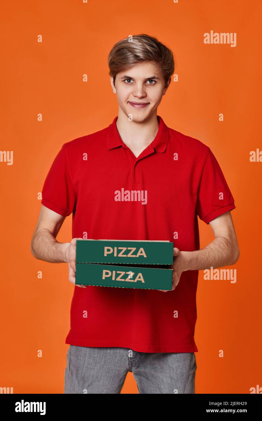 Carrying pizza boxes hires stock photography and images Alamy