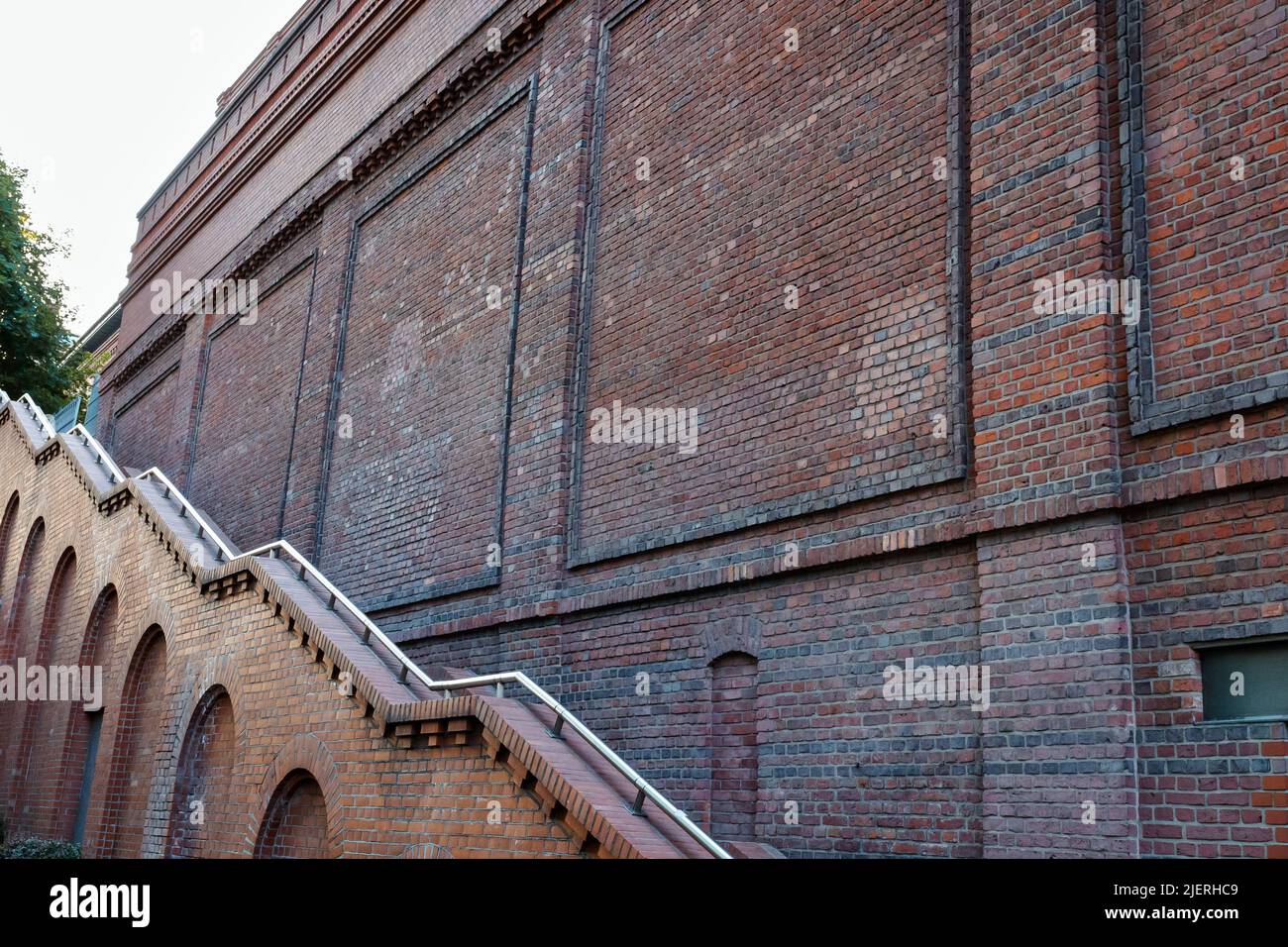 POZNAŃ, POLAND - JUNE 16, 2022:  Stairs at the back of the 'Stary Browar' building - the center of commerce and art, built in November 2003 Stock Photo