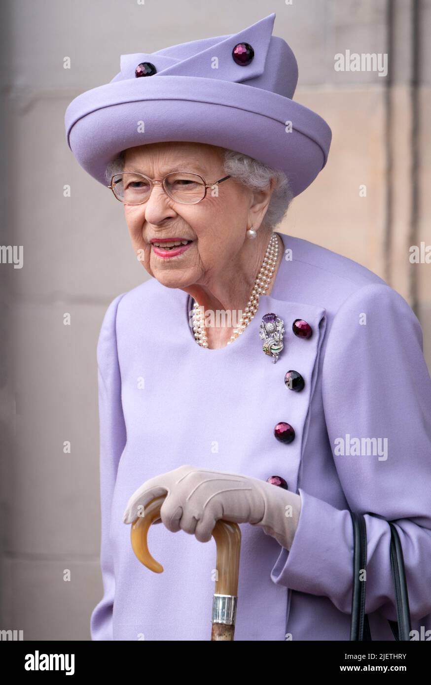 Queen Elizabeth II attends an armed forces act of loyalty parade in the