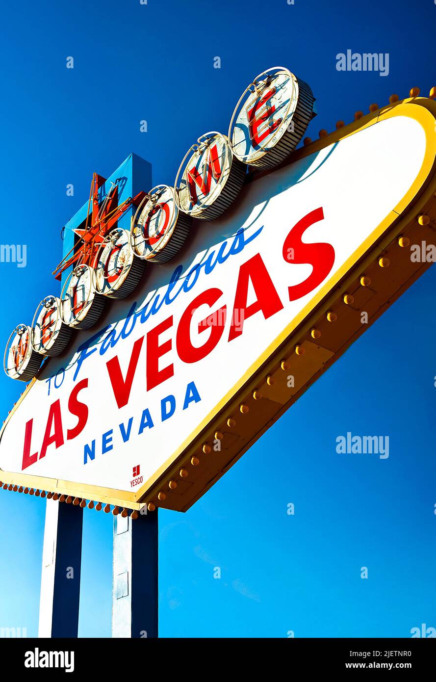 The Welcome to Las Vegas Sign with bright blue sky Stock Photo