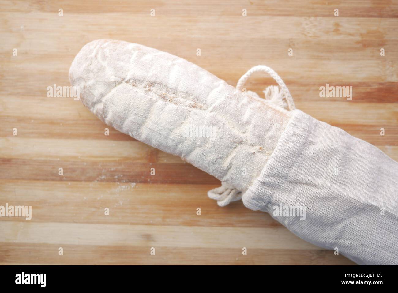 baked bread stored in a reusable linen bag . Eco friendly Zero waste
