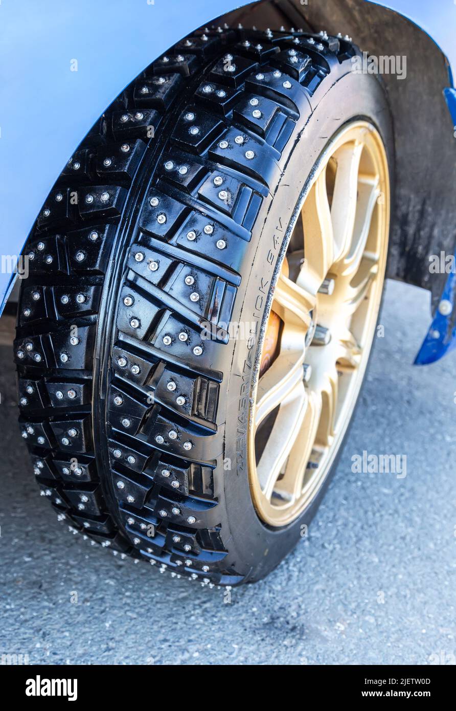 Samara, Russia - June 26, 2022: Winter vehicle studded tire of the car. New studded tyre close up Stock Photo