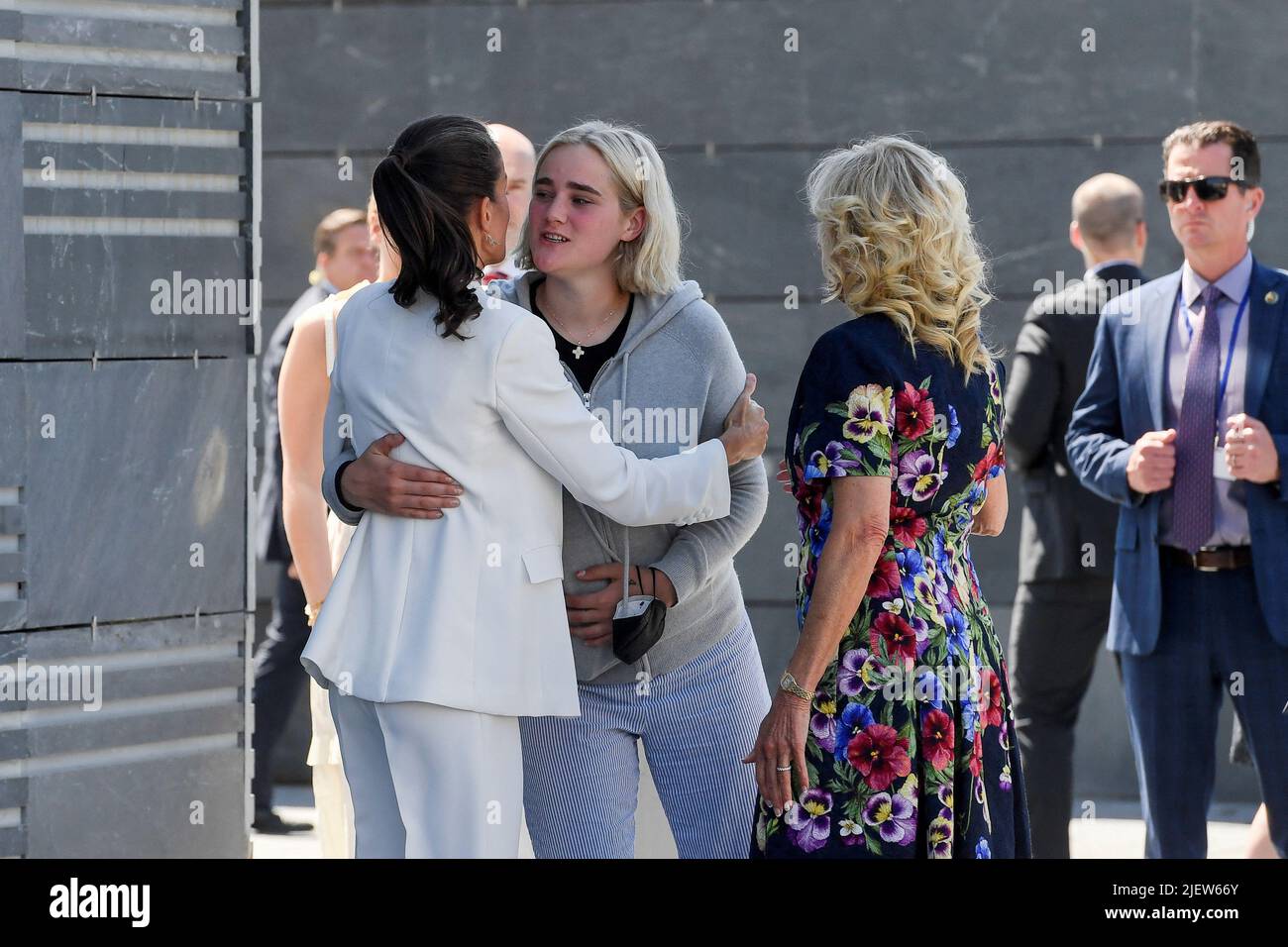 Spain's Queen Letizia welcomes U.S. first Lady Jill Biden and her granddaughters Finnegan and Maisy Biden, as they arrive for the visit of a reception centre for Ukrainian refugees in Pozuelo de Alarcon, on the sidelines of a NATO summit, near Madrid, Spain, June 28, 2022. Oscar del Pozo/Pool via REUTERS Stock Photo