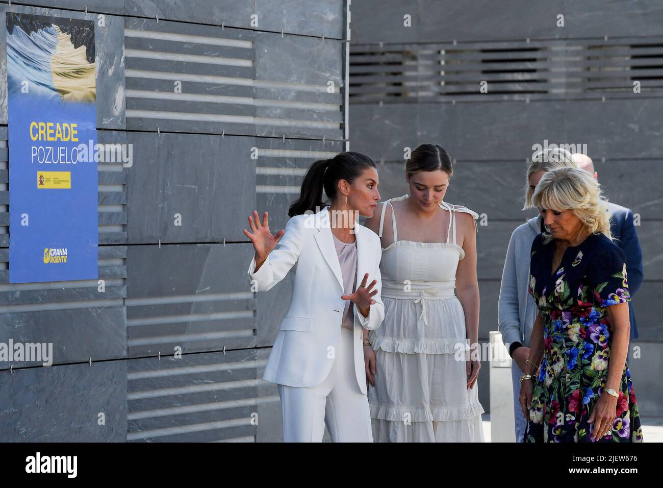 Spain's Queen Letizia welcomes U.S. first Lady Jill Biden and her granddaughters Finnegan and Maisy Biden, as they arrive for the visit of a reception centre for Ukrainian refugees in Pozuelo de Alarcon, on the sidelines of a NATO summit, near Madrid, Spain, June 28, 2022. Oscar del Pozo/Pool via REUTERS Stock Photo