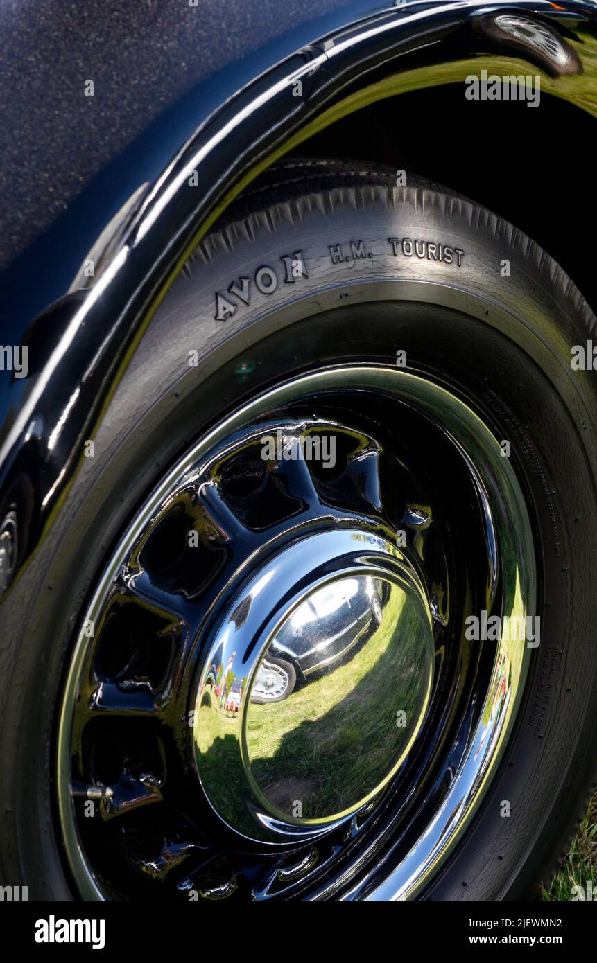 vintage classic car pressed steel wheel and perished tyre Stock Photo