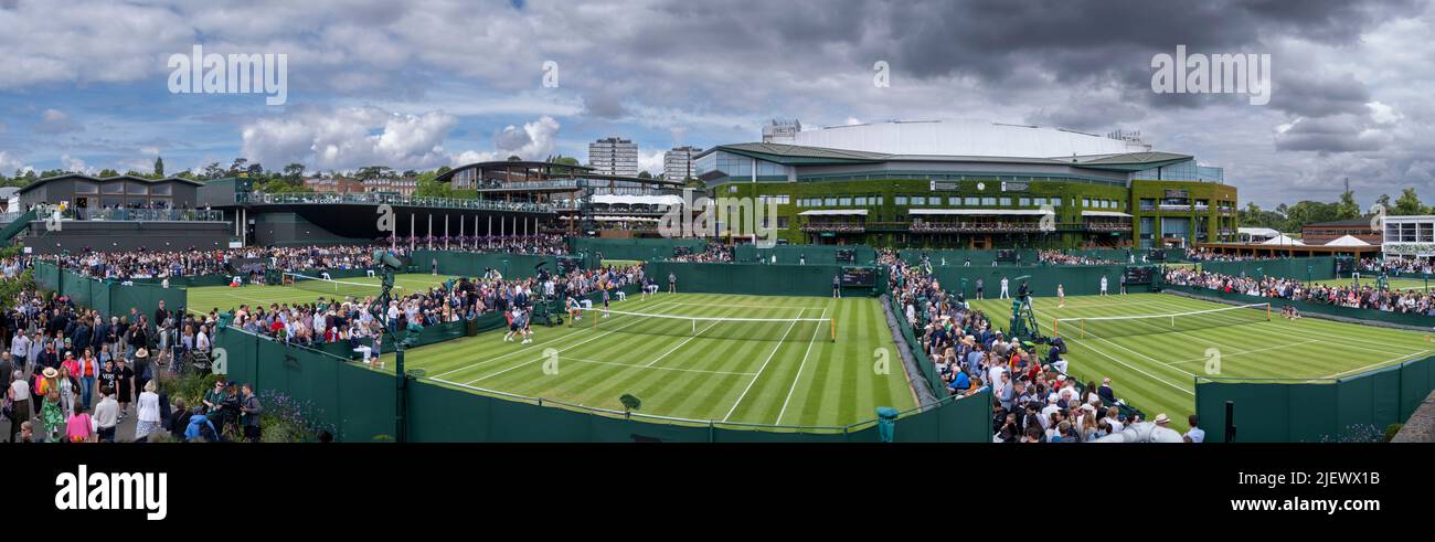 London, UK, 28th June 2022: People walk through the All England Lawn Tennis and Croquet Club in London. Credit: Frank Molter/Alamy Live news Stock Photo