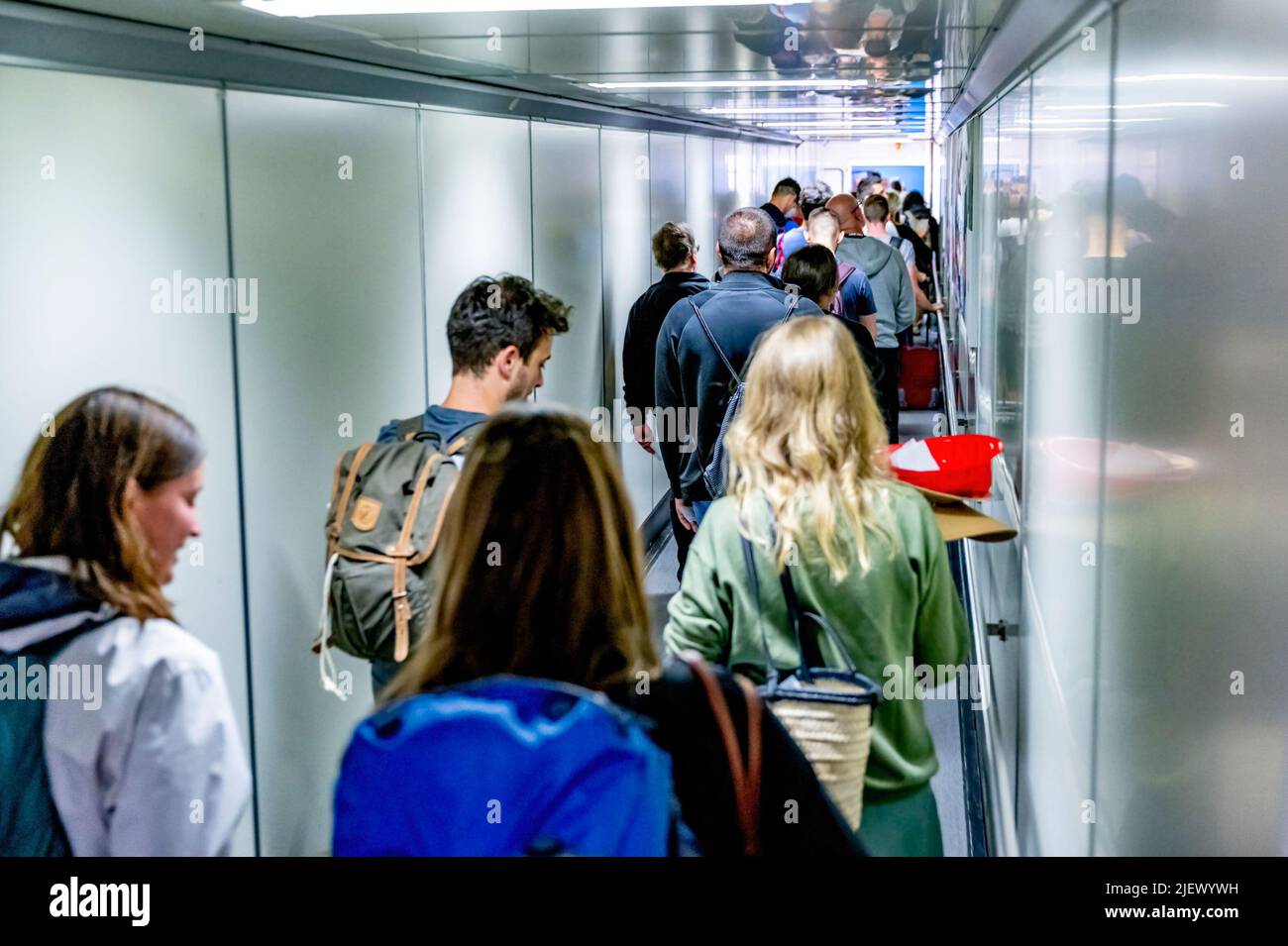 Schiphol, Netherlands. 26th June, 2022. A long queue of travelers is