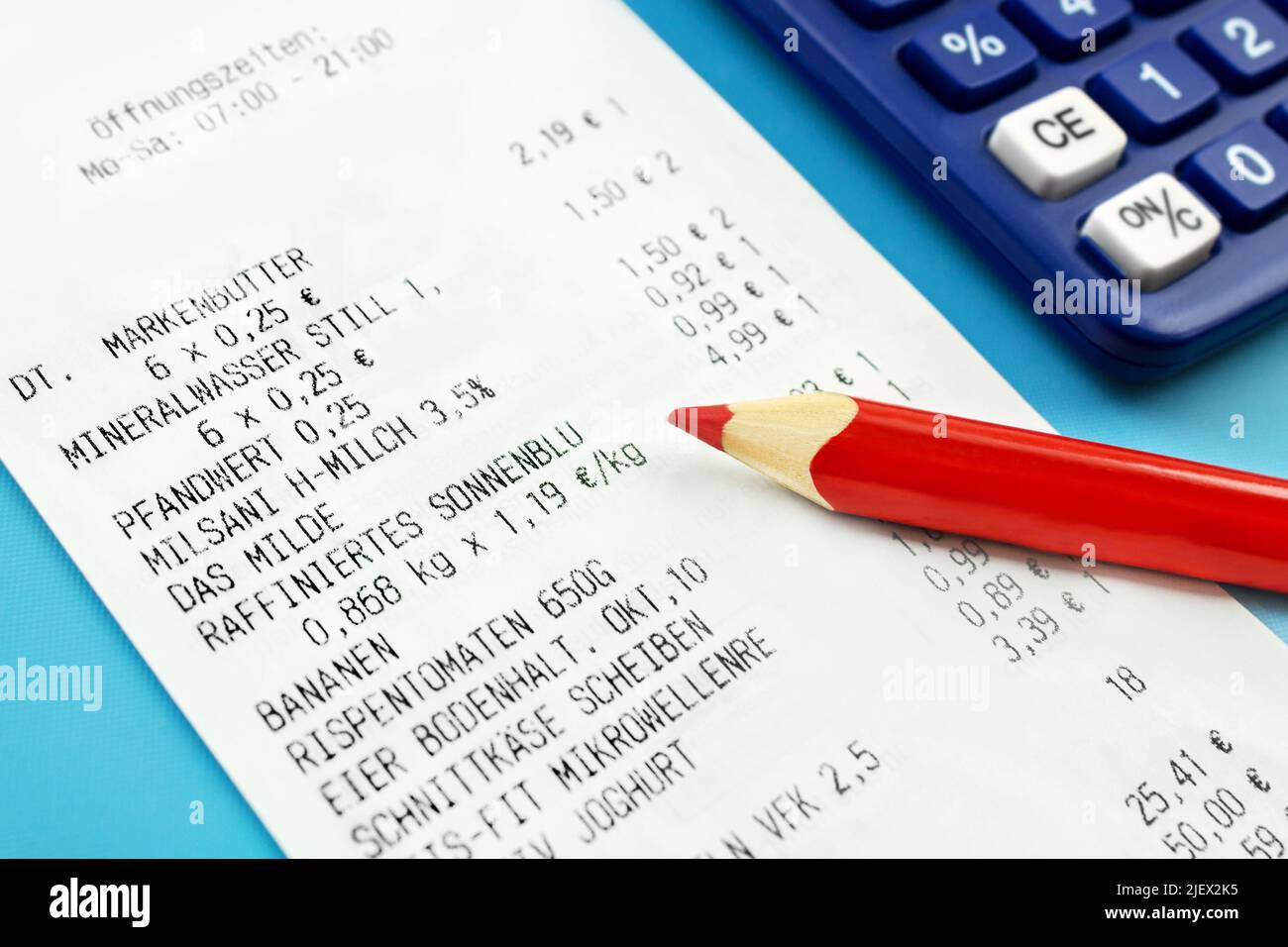 German purchase voucher staple foods with calculator and red pencil Stock Photo