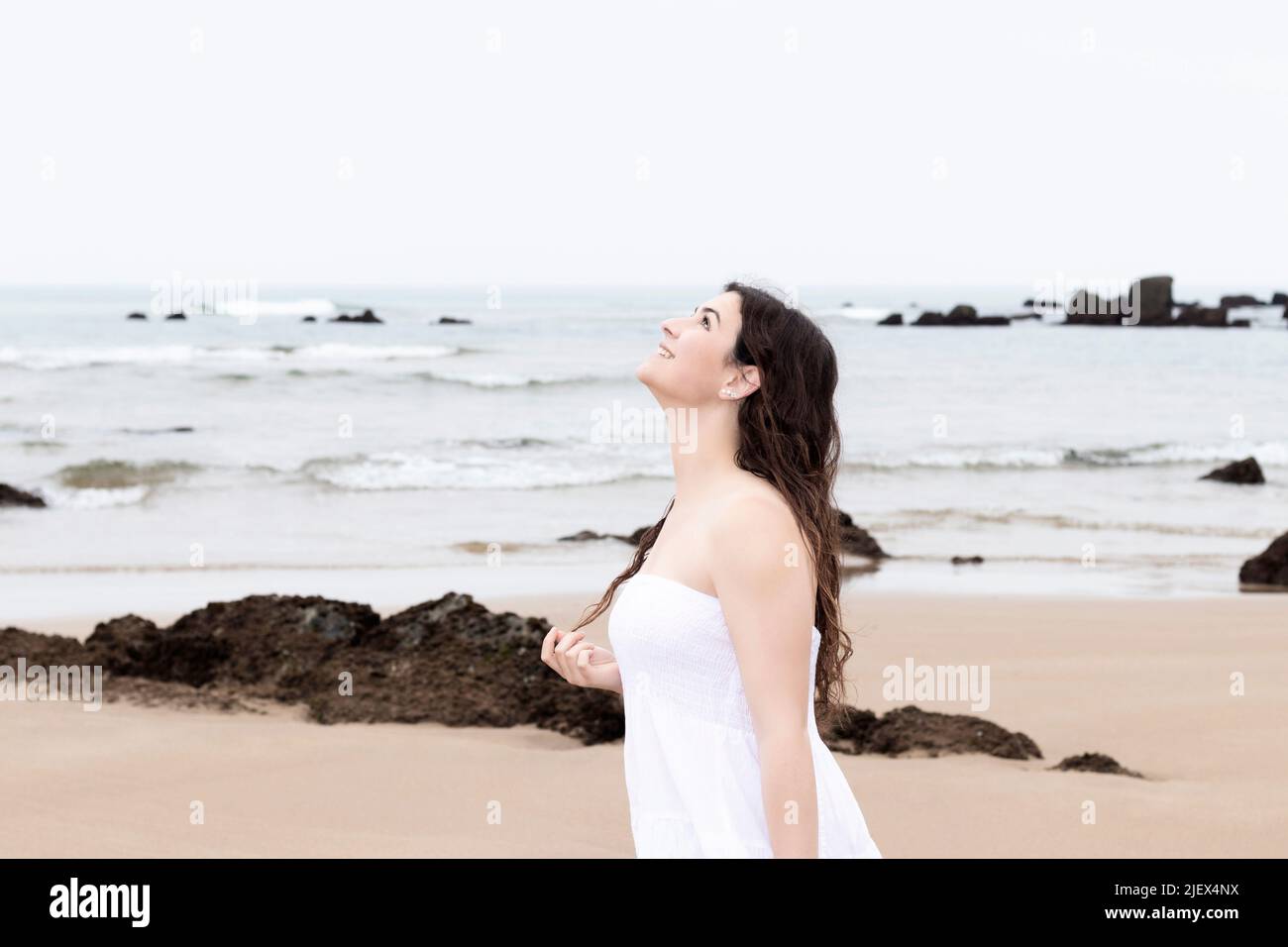 Woman in white dress on hi-res stock photography and images - Alamy