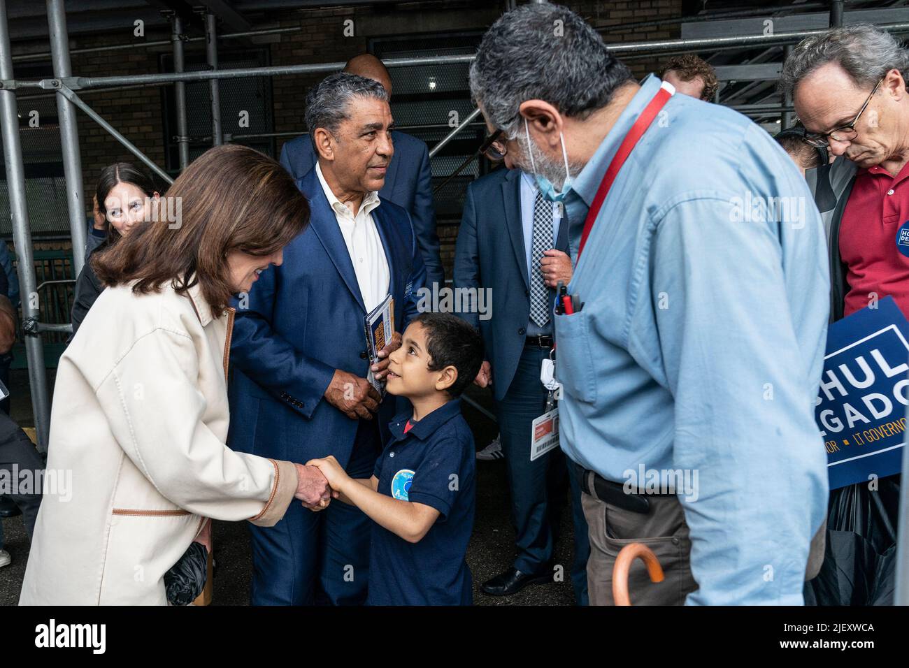 New York, United States. 27th June, 2022. Governor Kathy Hochul greets  young boy during campaign stop alone with Lieutenant Governor Antonio  Delgado in Washington Heights. Antonio Delgado is running for Lieutenant  Governor