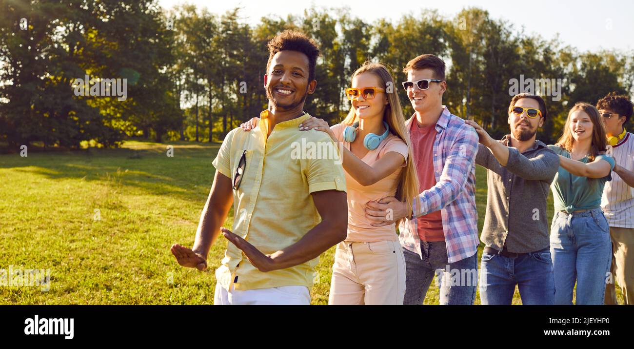 Group conga line dance hires stock photography and images Alamy