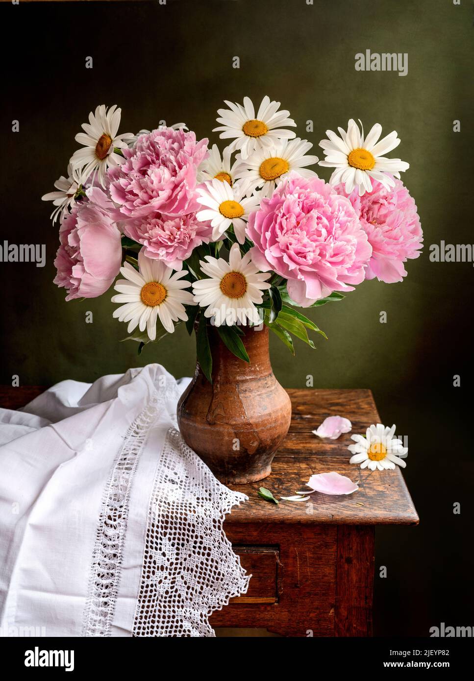 Still life with flowers of peonies on a table. Still life with pink ...
