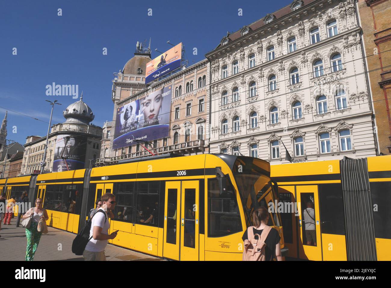 Two trams at the tram stop in Blaha Lujza ter, Budapest, Hungary Stock Photo