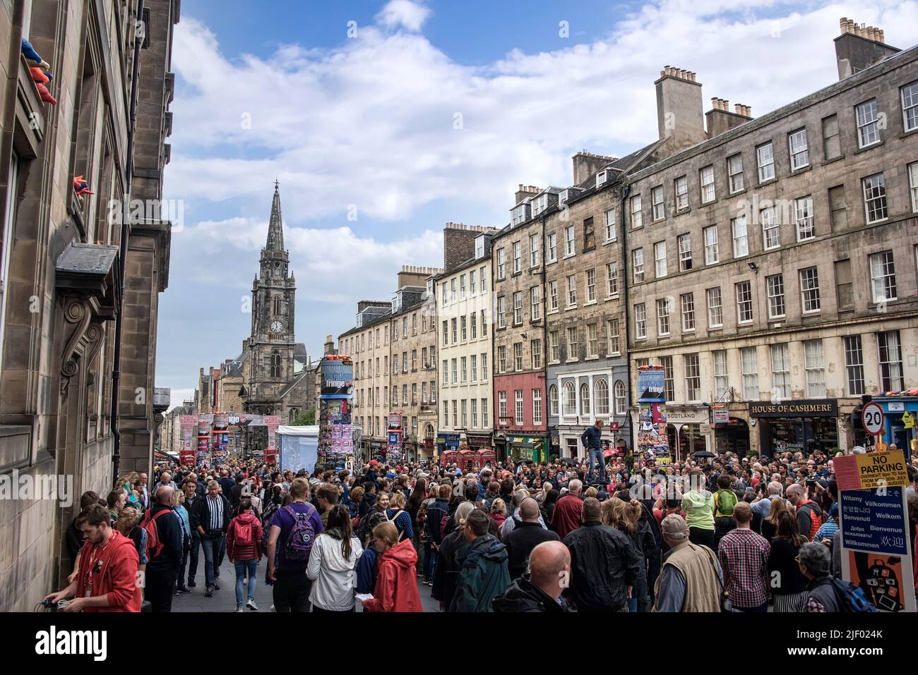 Edinburgh, Scotland - August 14, 2018: The Royal Mile, crowded with tourists, is a main attraction for visitors. Stock Photo