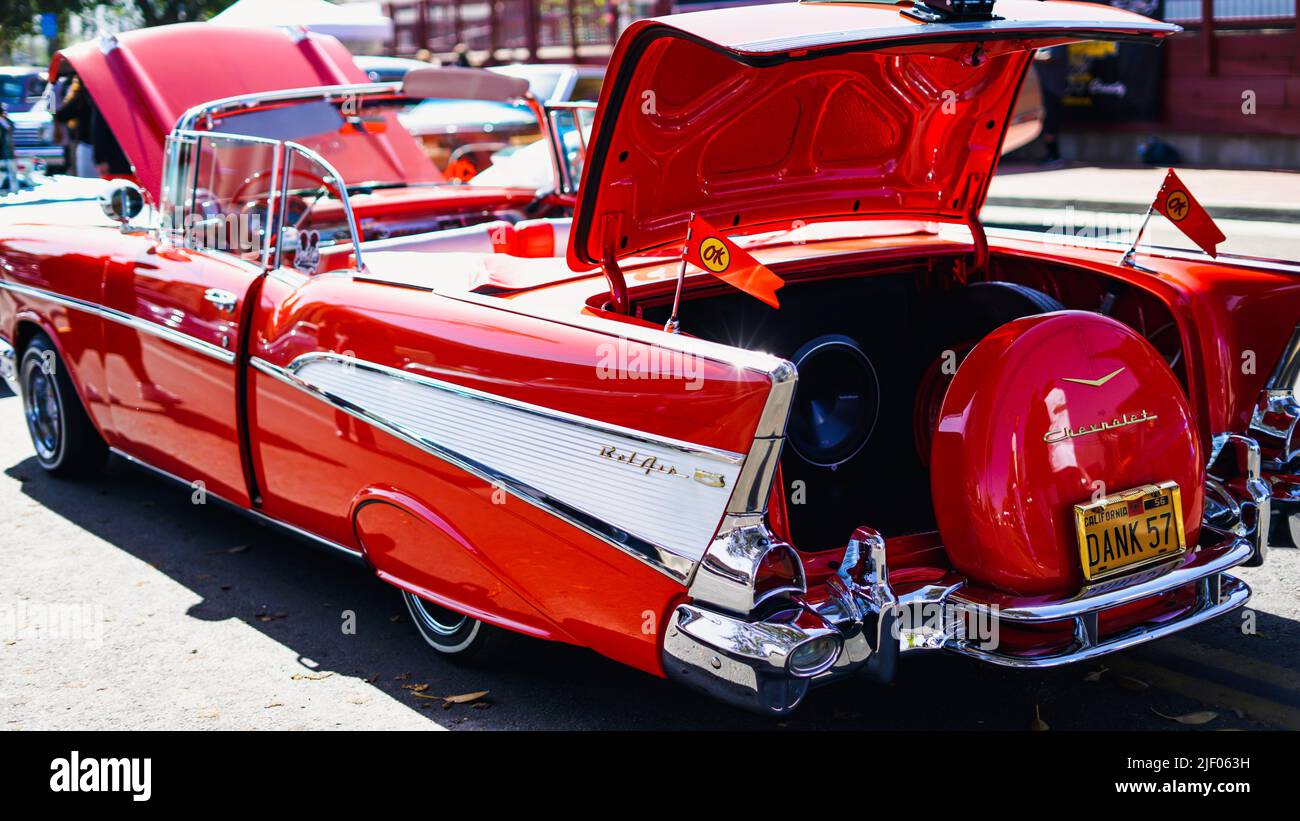 A red cabriolet Chevrolet impala in a classic car show in Santa Paula