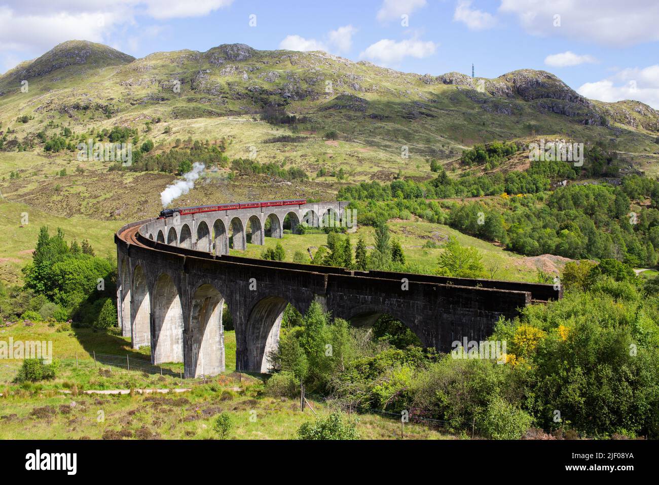 An aerial view of the Hogwarts Express on Glenfinnan Viaduct in