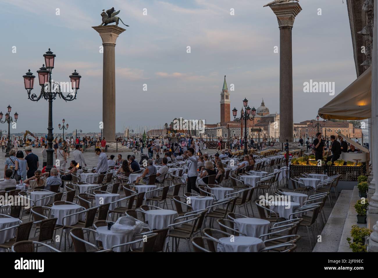 People sitting in restaurant on St. Mark's Square, Venezia, Italy Stock Photo