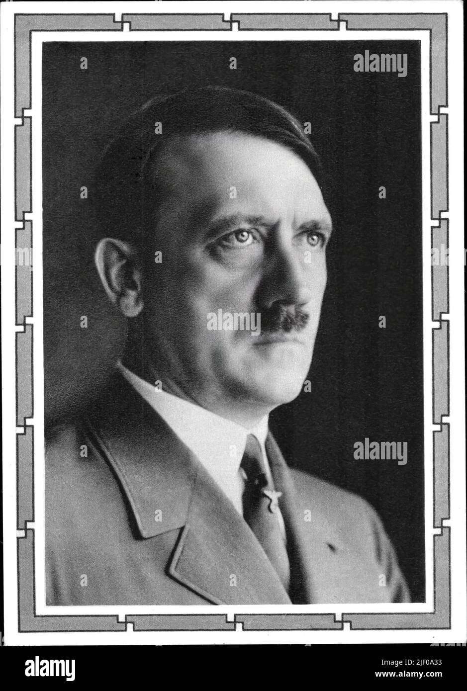 ADOLF HITLER 1930's official Studio Hoffmann Portrait in original swastika theme frame overlay of Fuhrer Adolf Hitler propaganda image in Nazi Germany for posters and postcards Stock Photo