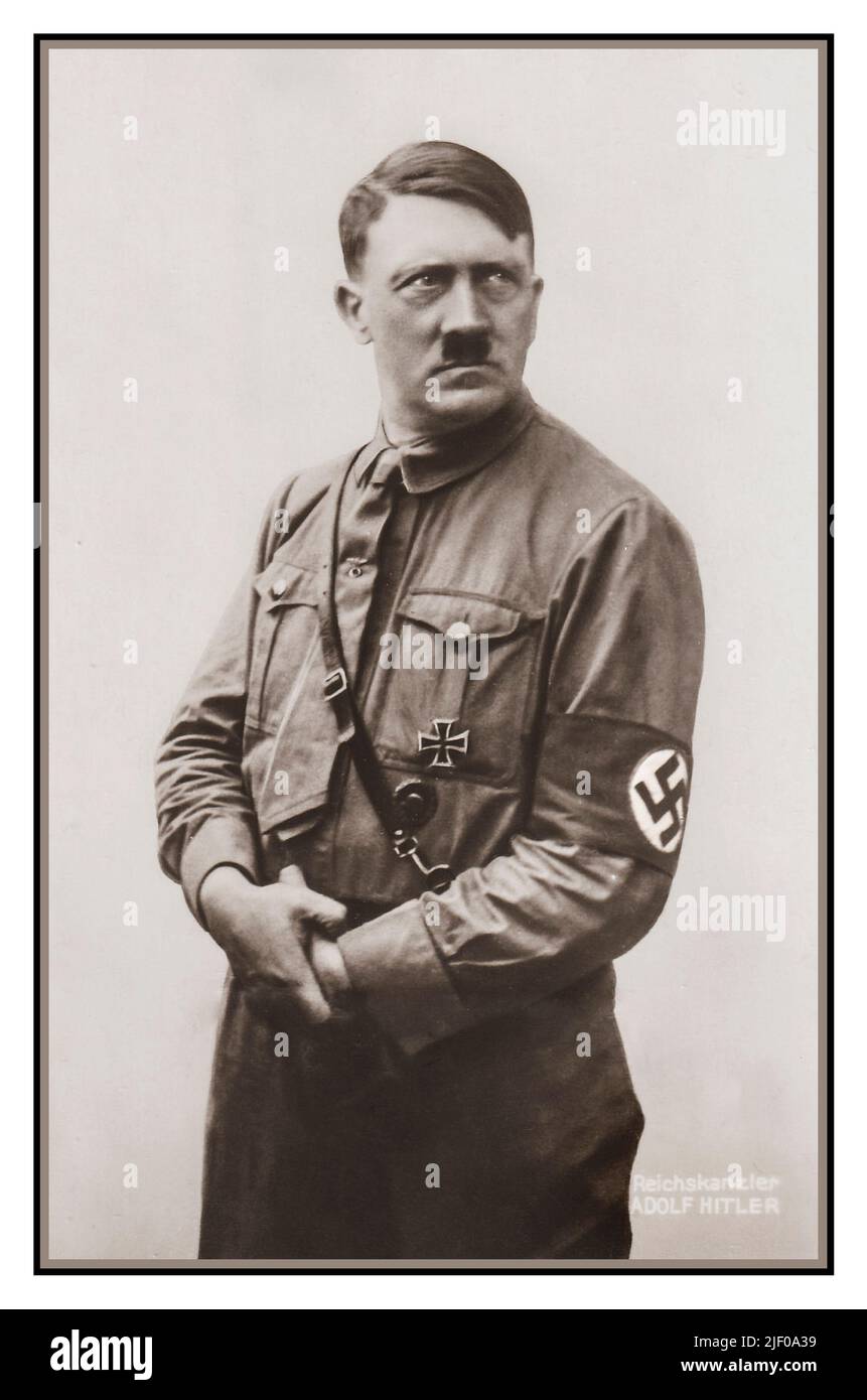 Adolf Hitler 1934 as 'The Reichskanzler' in Sturmabteilung SA uniform (The Brown Shirts) wearing a Nazi Swastika armband Nazi Germany 1930s. Führer und Reichskanzler (leader and chancellor of the Reich). Sturmabteilung; SA; literally "Storm Detachment") was the Nazi Party's (National Socialist German Workers' Party) original paramilitary wing and became the NSDAP Stock Photo